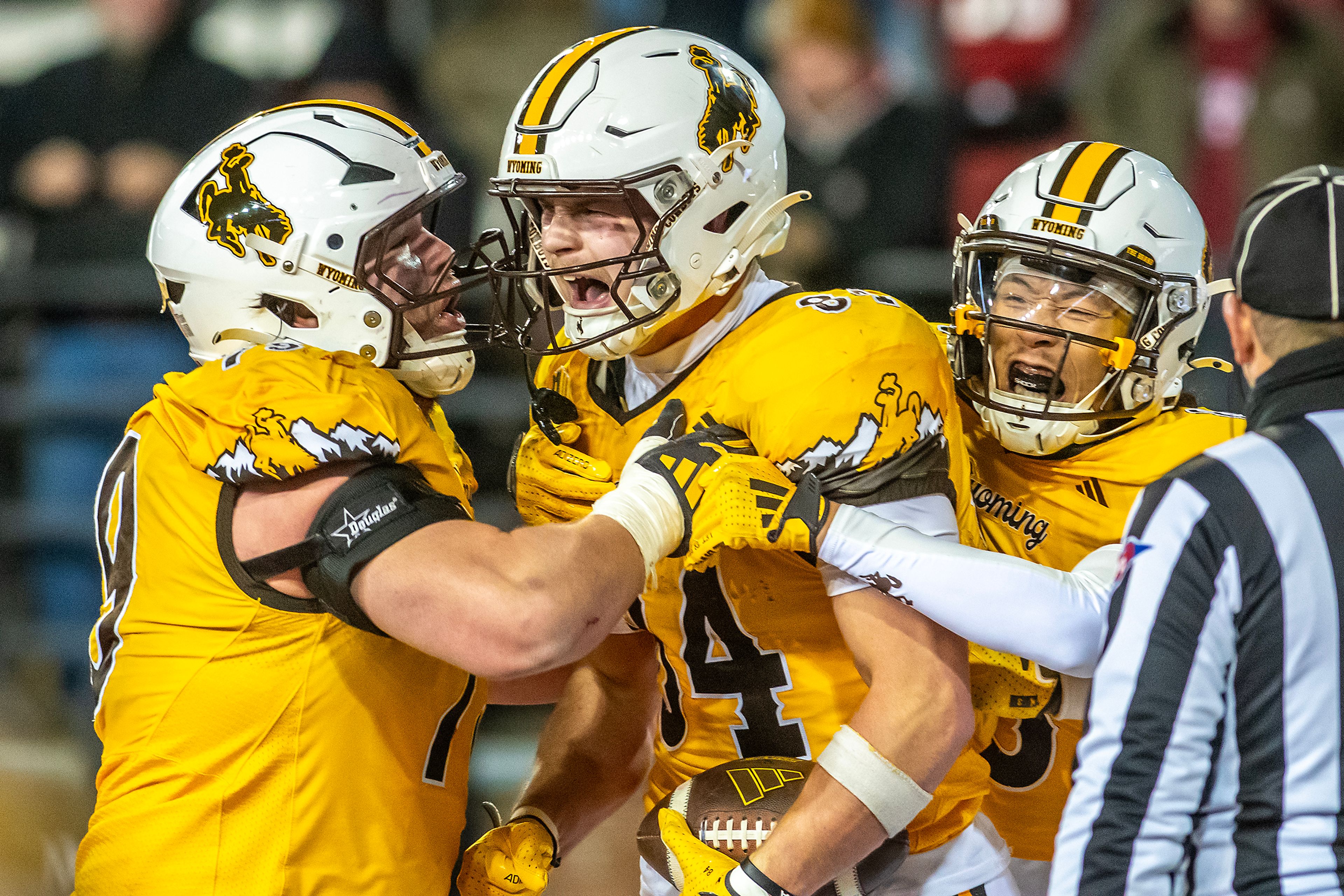 Wyoming tight end John Michael Gyllenborg reacts after scoring the game winning touchdown against Washington State during a quarter of a college football game on Saturday, at Gesa Field in Pullman. Wyoming defeated Washington State 15-14.