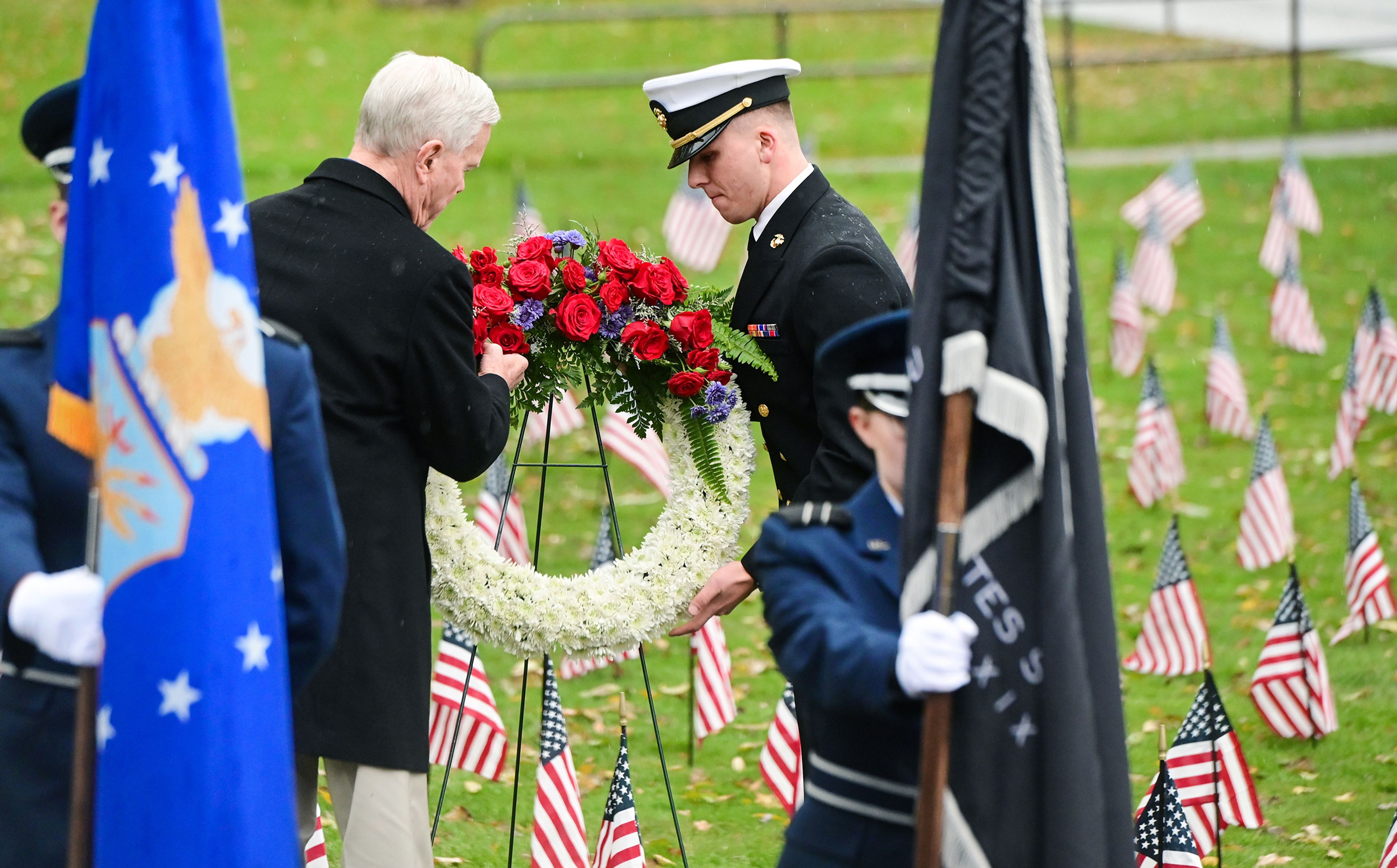 Gen. James F. Amos, left, and Cody Dotson, right, a midshipmen in the University of Idaho’s ROTC program, lay a wreath during the UI Veterans Day ceremony Monday in Moscow.