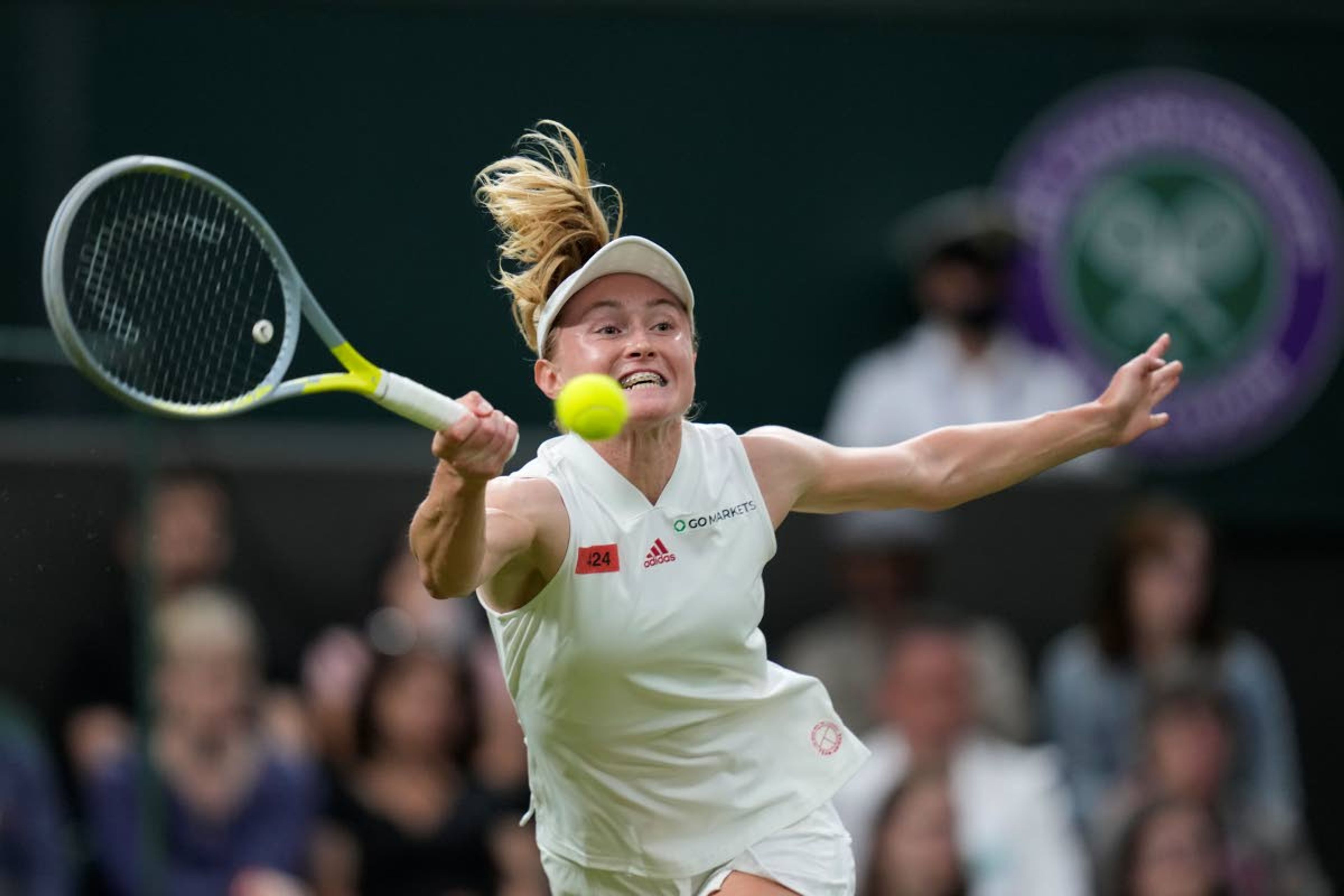 Aliaksandra Sasnovich of Belarus plays a return to Serena Williams of the US for the women's singles first round match on day two of the Wimbledon Tennis Championships in London, Tuesday June 29, 2021. (AP Photo/Kirsty Wigglesworth)