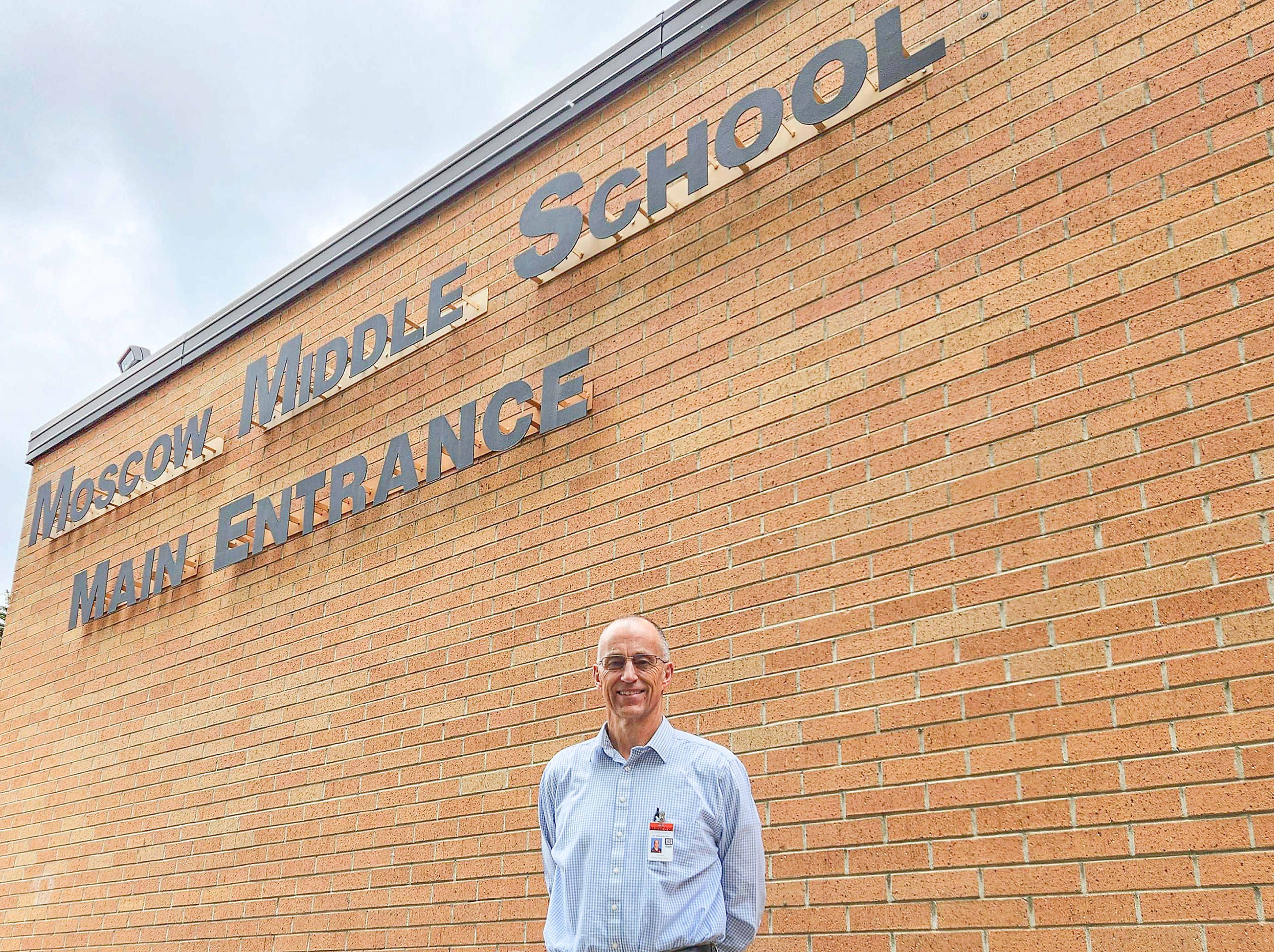 Bill Holman stands at Moscow Middle School for a picture Wednesday in Moscow.