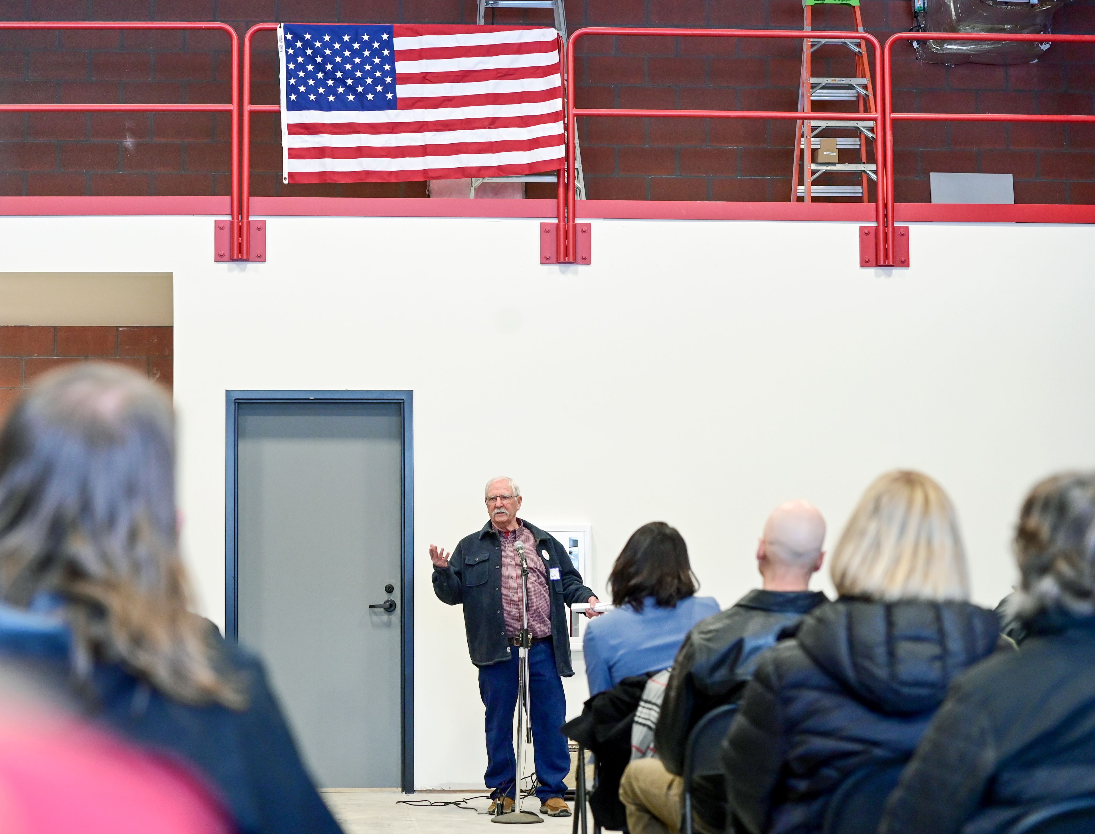 Malden Mayor Dan Harwood, center, speaks to those gathered for a ribbon cutting at the town’s new facilities on Thursday, recognizing individuals and organizations that helped with recovery efforts for the town after a wildfire in 2020.