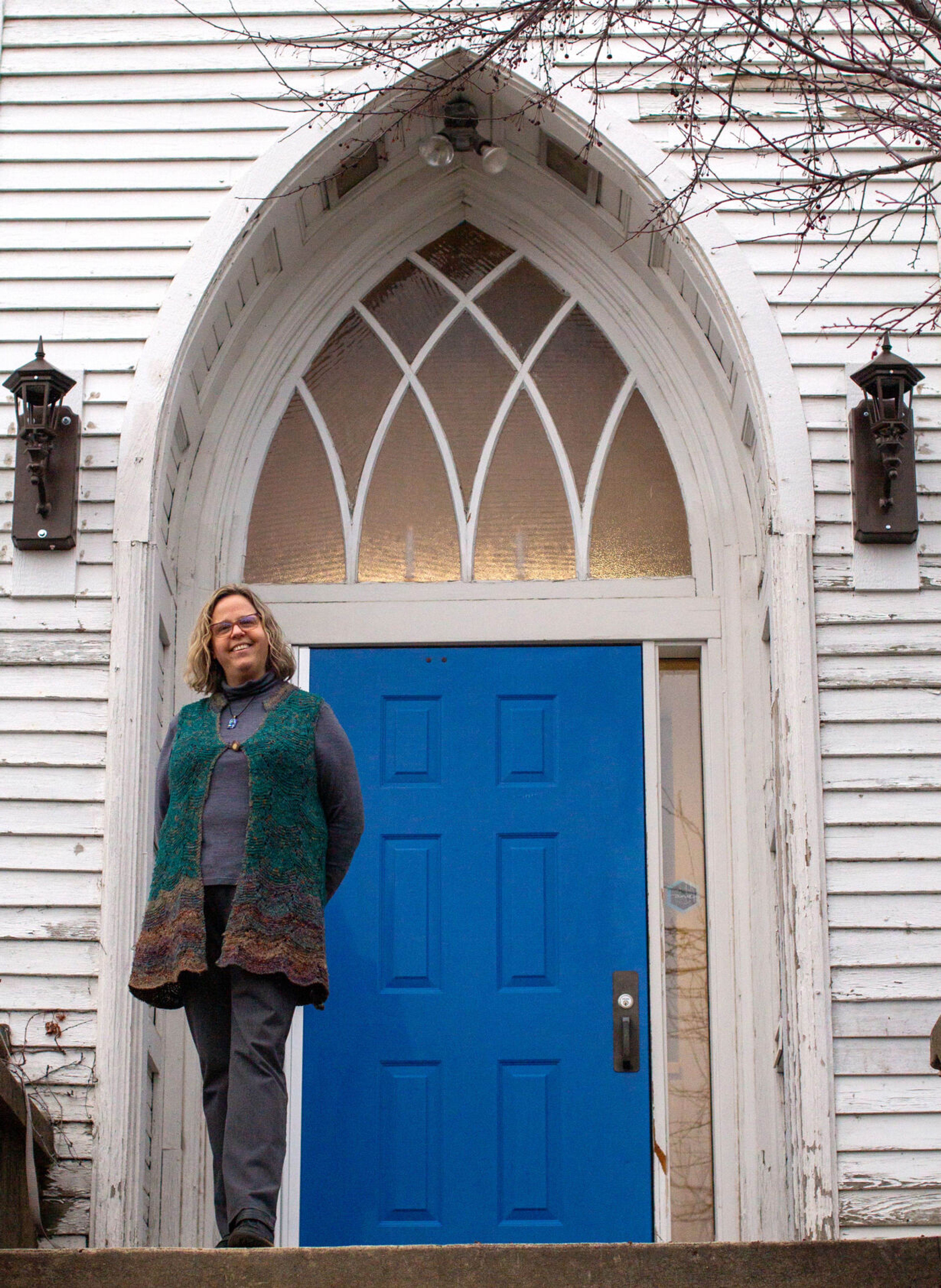 Rev. Elizabeth Stevens stands in front of the Unitarian Universalist Church of the Palouse in Moscow. During a cold snap this winter, the church offered its building as a shelter for those without a place to stay.