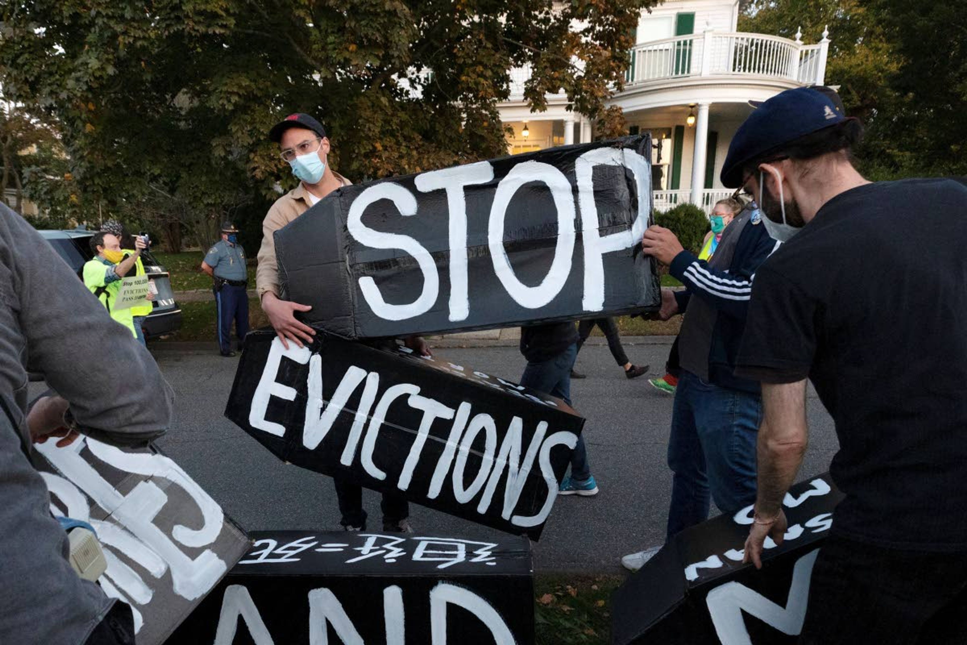 Associated PressIn this photo taken Oct. 14, housing activists erect a sign in Swampscott, Mass. A federal freeze on most evictions is set to expire soon. The moratorium, put in place by the Centers for Disease Control and Prevention in September, was the only tool keeping millions of tenants in their homes.