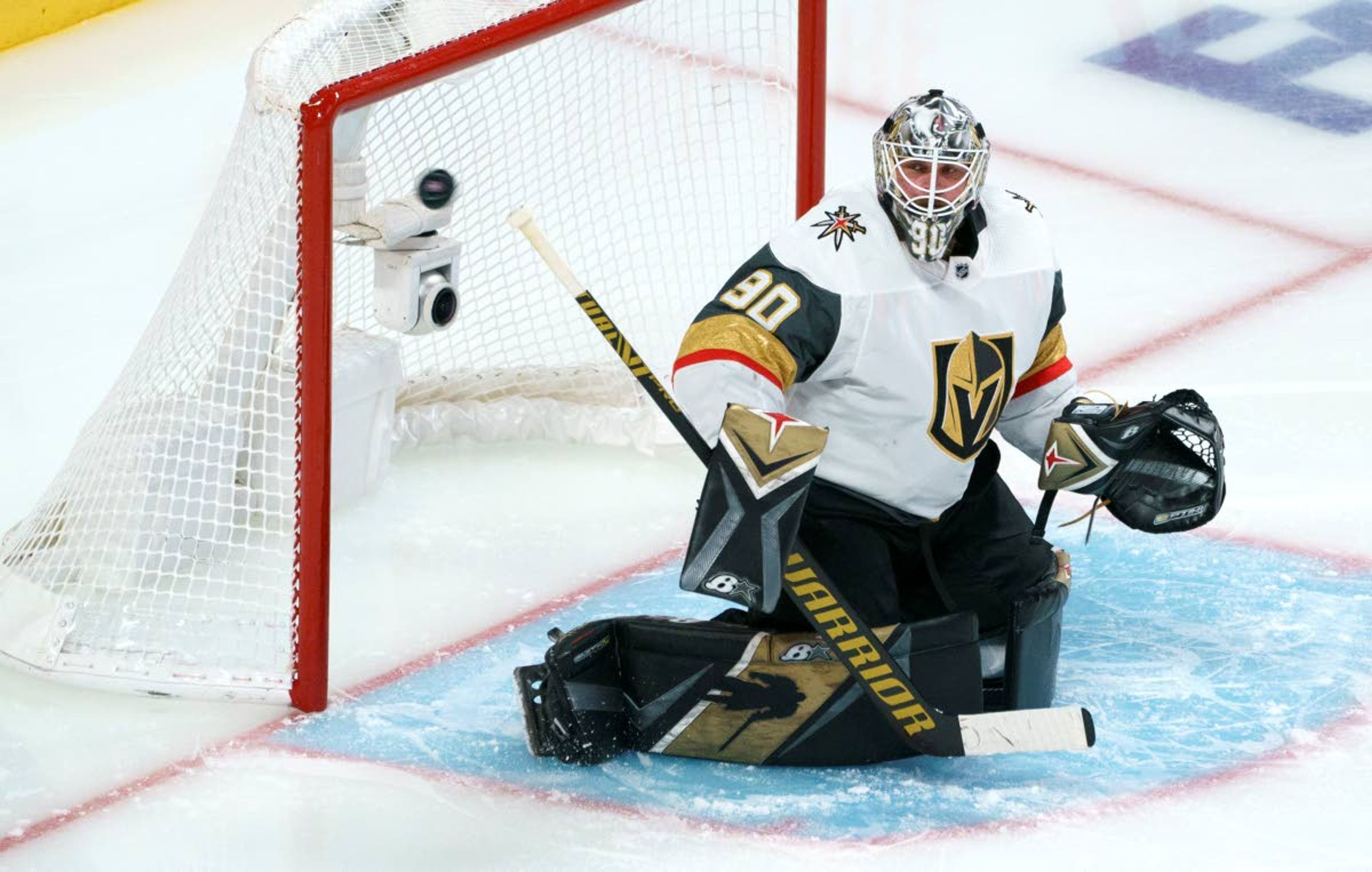 Vegas Golden Knights goaltender Robin Lehner deflects a shot wide of the net during the second period in Game 6 of an NHL hockey Stanley Cup semifinal playoff series against the Montreal Canadiens Thursday, June 24, 2021 in Montreal. (Paul Chiasson/The Canadian Press via AP)