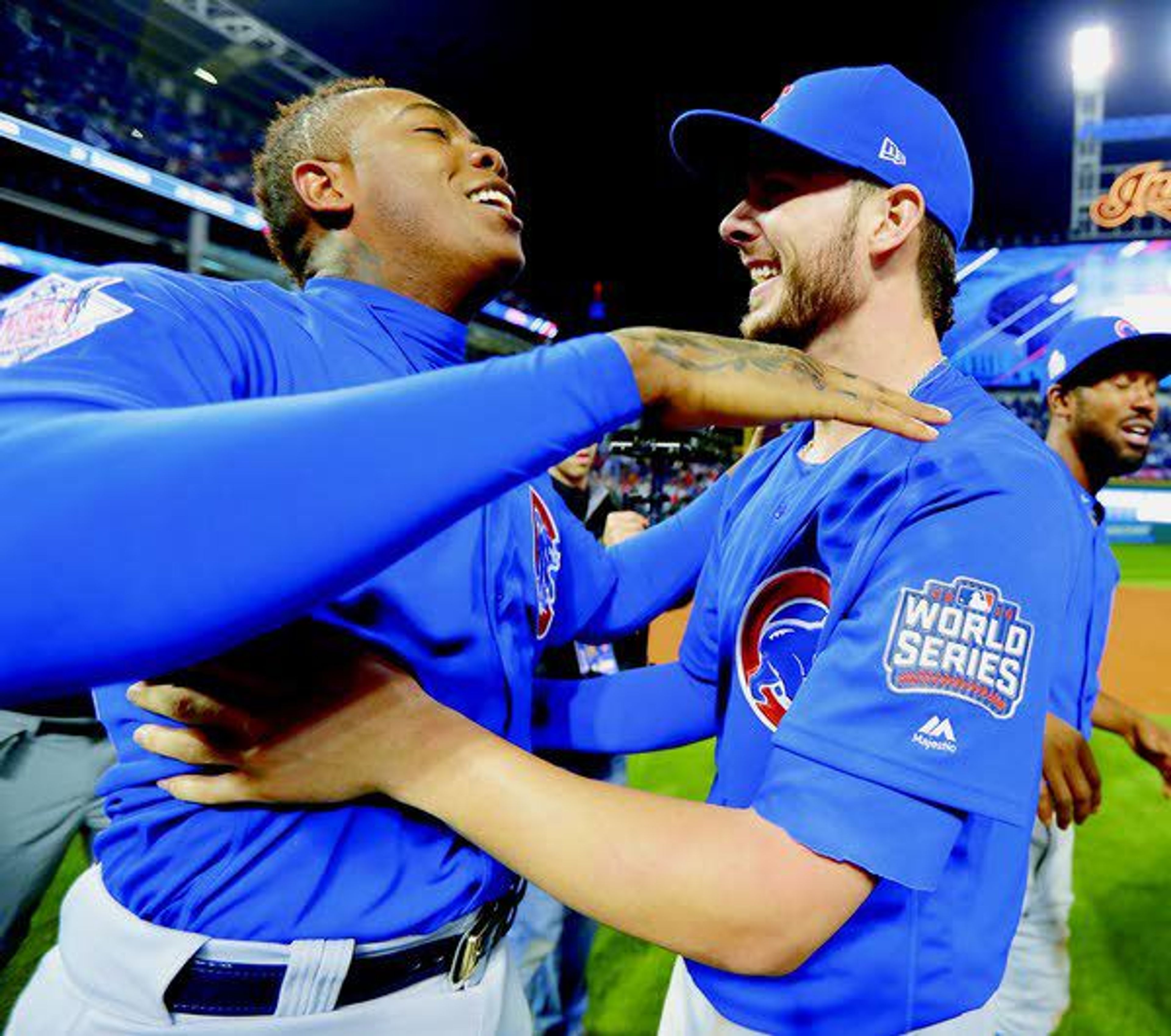 Chicago Cubs’ Aroldis Chapman, left, and Kris Bryant celebrate after Game 7 of the MLB World Series on Nov. 3 agains the Cleveland Indians in Cleveland. against the Cleveland Indians in Cleveland.