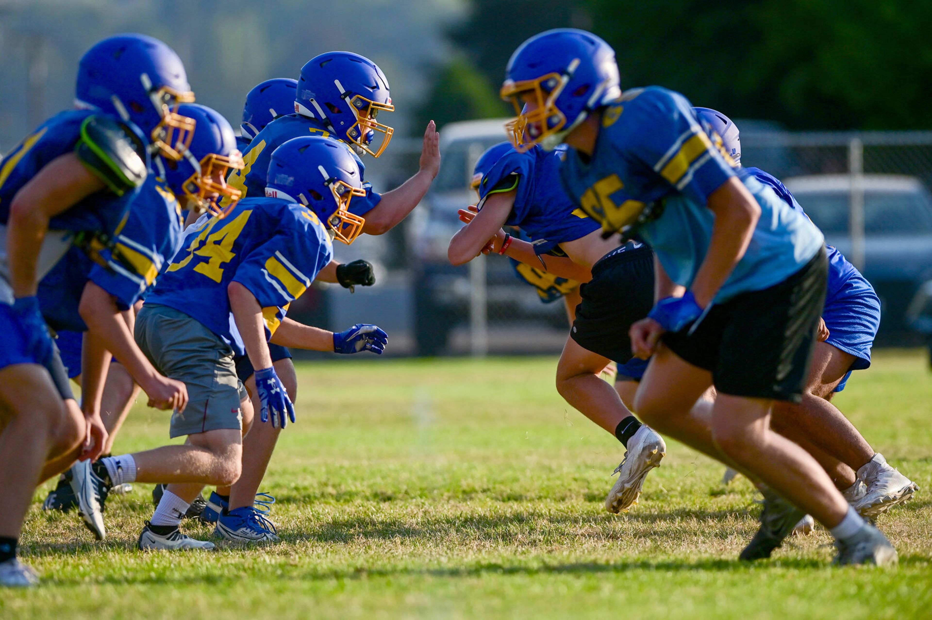 Colfax runs through plays at practice on Tuesday.