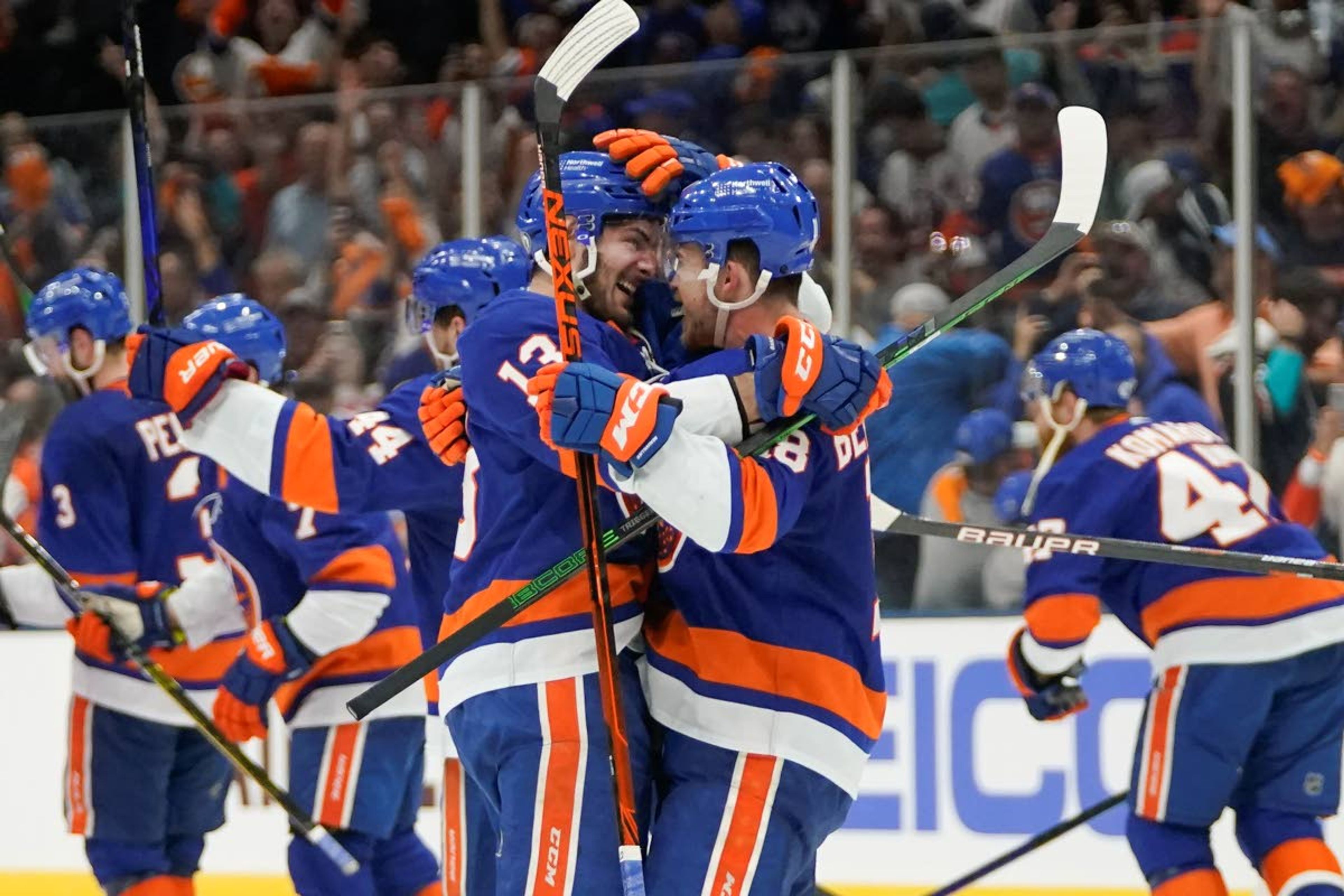 Associated PressThe Islanders’ Mathew Barzal (13) celebrates with Anthony Beauvillier after Beauvillier scored a goal during the overtime period of Game 6 of an NHL semifinals against the Lightning on Wednesday in Uniondale, N.Y.