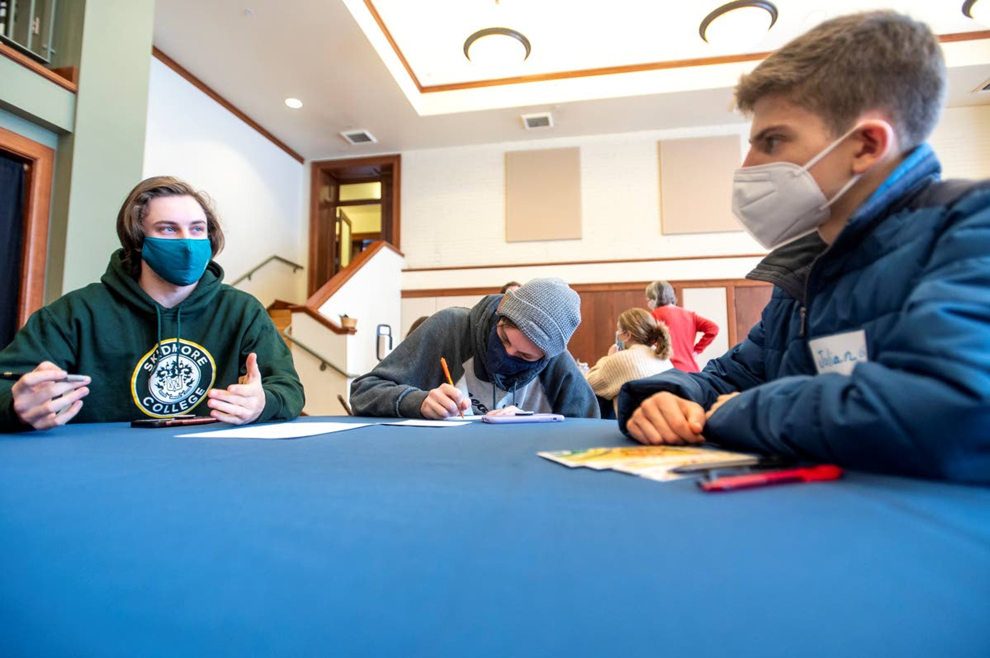 Kaelen Baird, left, a sophomore at Skidmore College, speaks Monday afternoon with Julian Gossard, a junior at Pullman High School, during a Palouse Pathways student forum about current students’ college experience in the Great Room at the 1912 Center in Moscow.