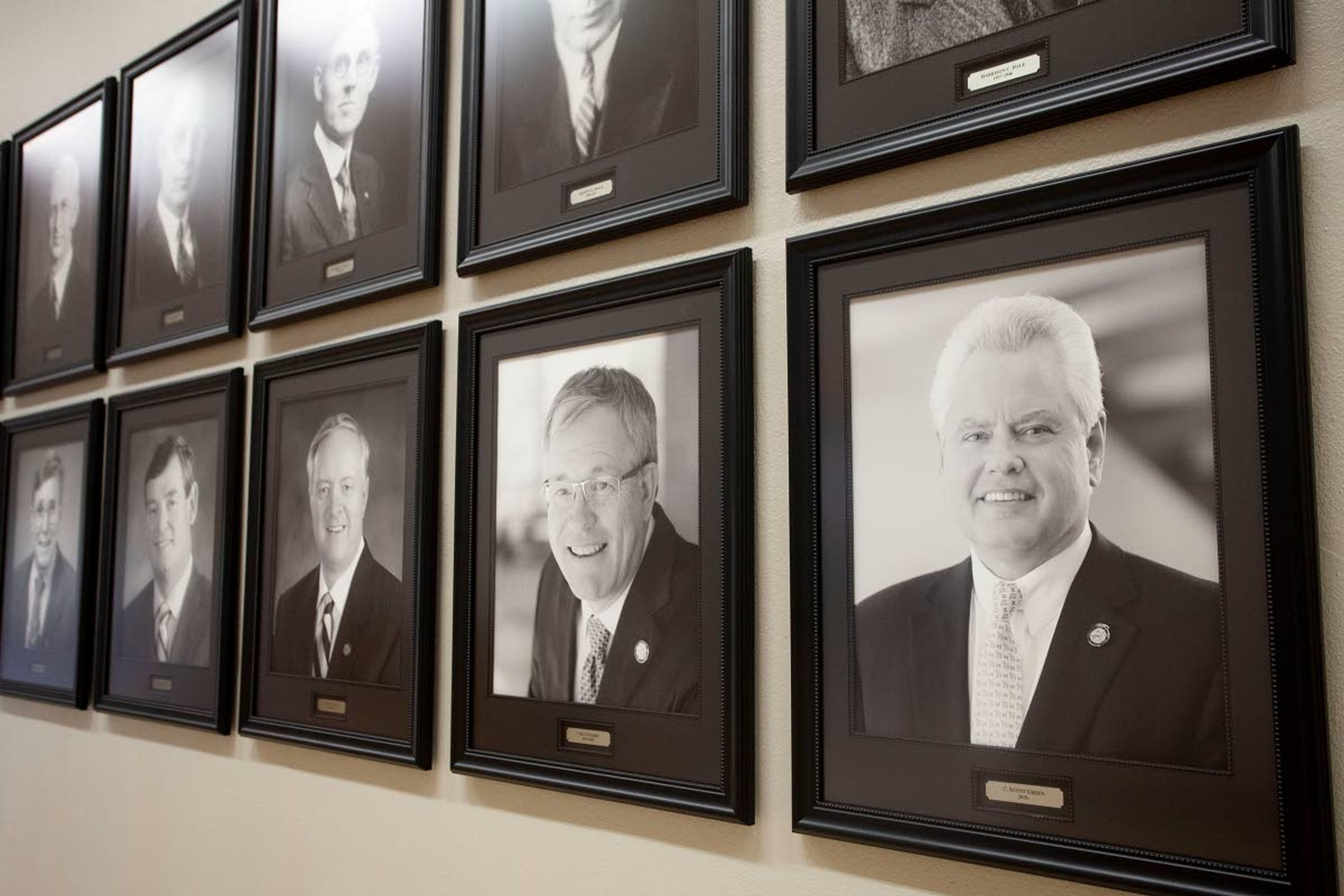 A portrait of the new University of Idaho president, Scott Green, right, has been added to a gallery at the UI Administration building.