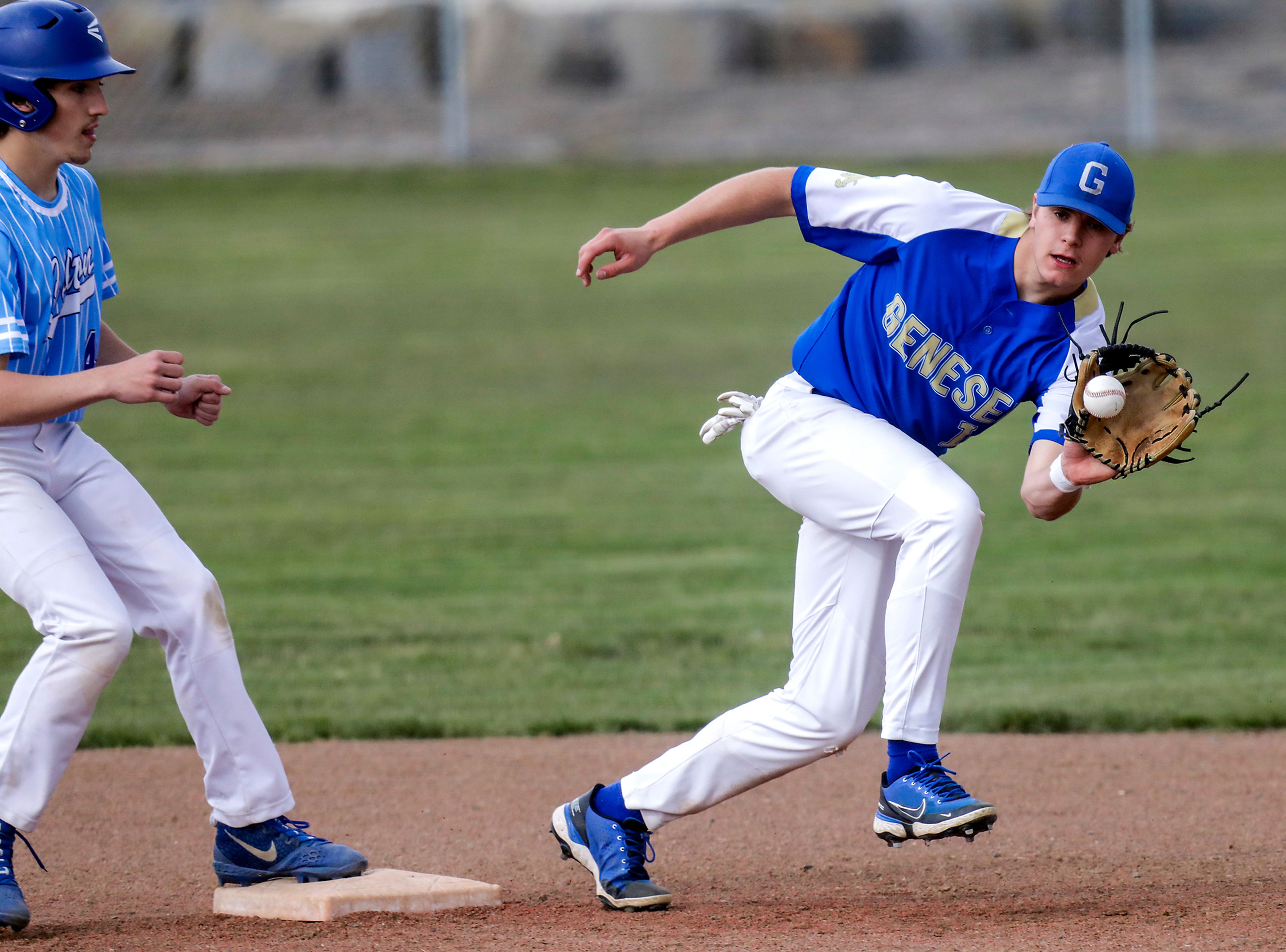 Genesee’s Jack Johnson snags a ball destined back to second base during a game in Genesee earlier this season.