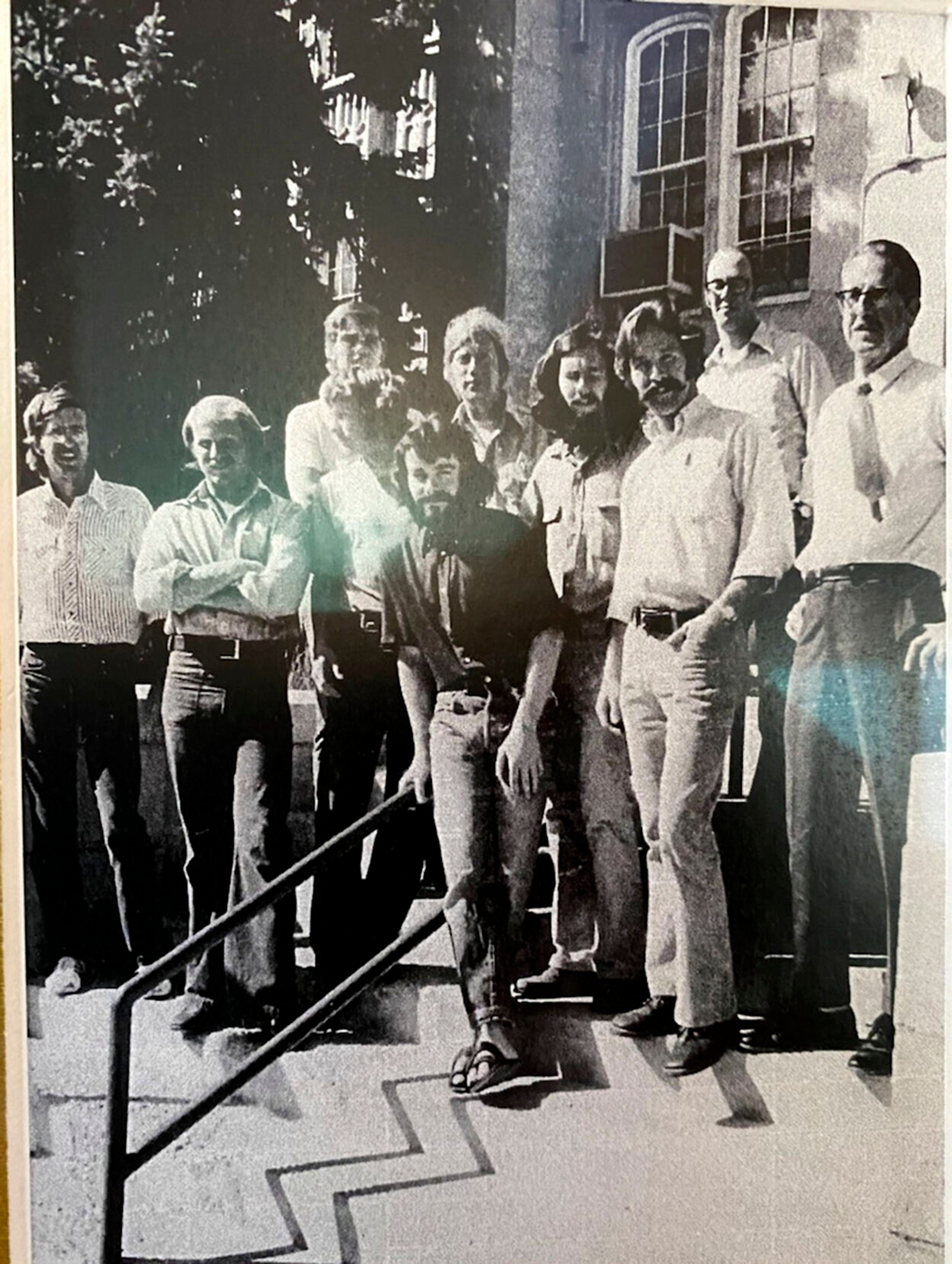 WWAMI members, from left in front row, unidentified, Rob Vieth, Steven Johnson, Patrick Daily, Pat Holland, unidentified and Richard Lewis, and, from left back row, Jeff Hummel, Roland Pearsol, Francis Spain and Guy Anderson stand for a photo.