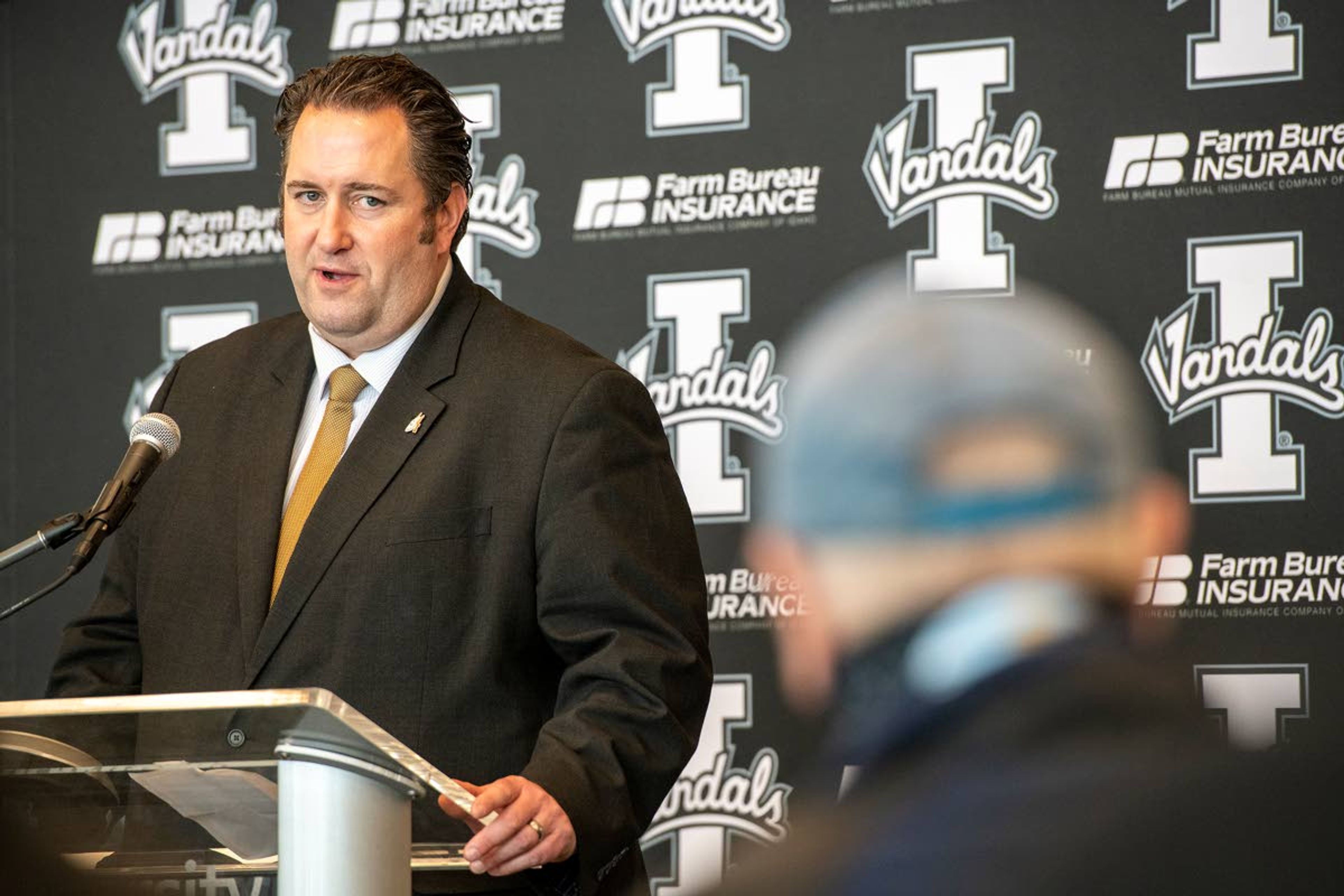 University of Idaho’s new head football coach Jason Eck answers questions posed by media members during his introductory news conference at Idaho Central Credit Union Arena on Monday afternoon in Moscow.