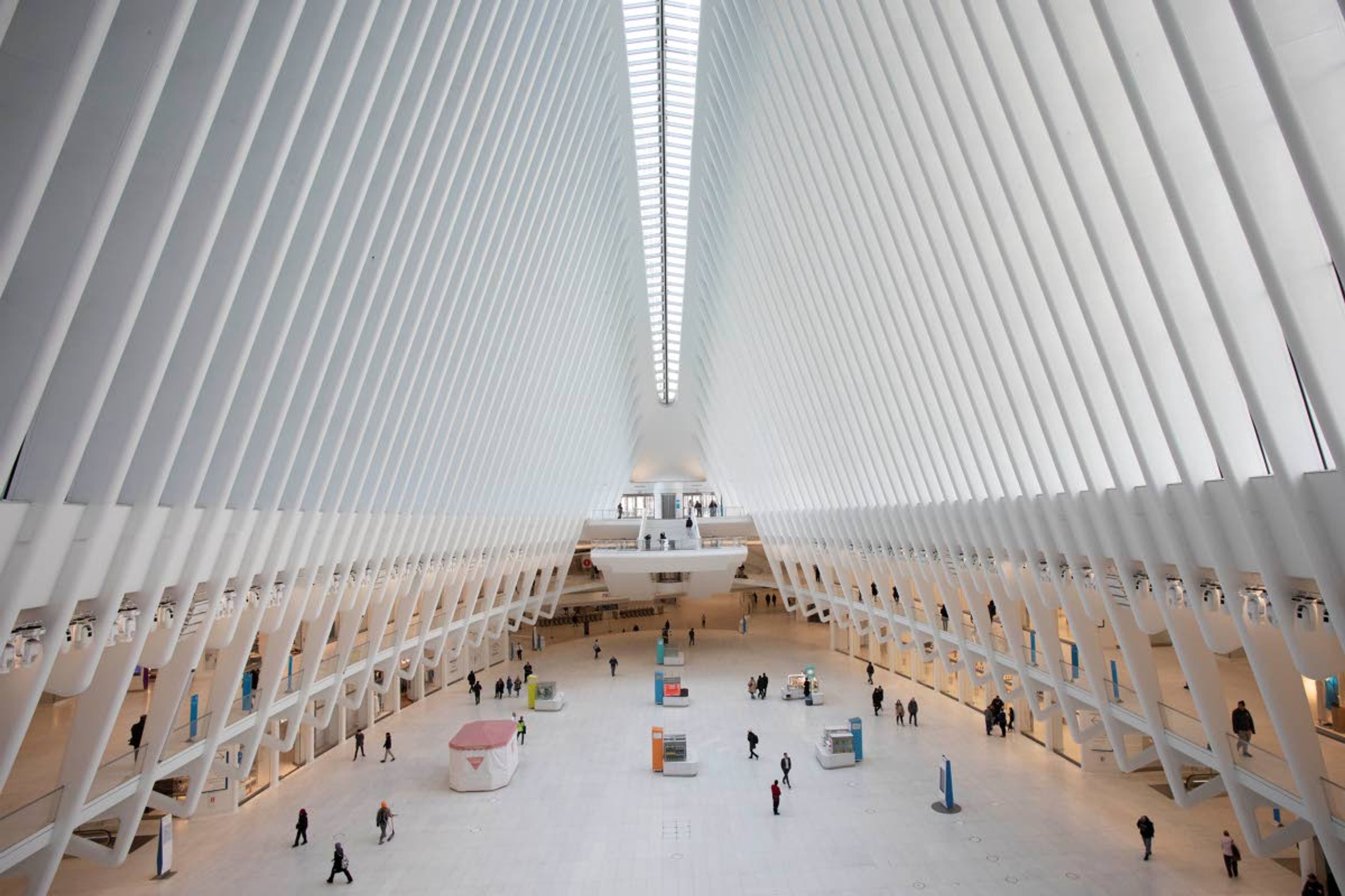 The Oculus at the World Trade Center’s transportation hub is sparsely occupied in March in New York City. Months later, few workers have returned to the central business districts, and New York real estate managers say it’s killing what people love best about the city and will have national repercussions.