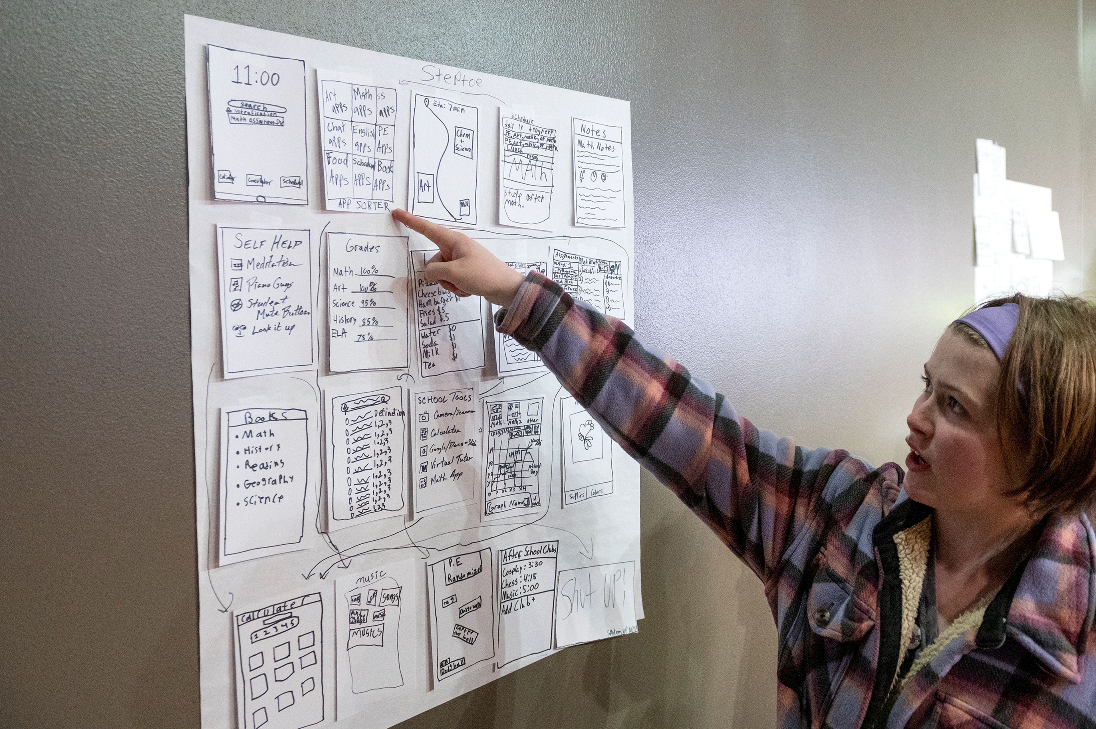 Sofie Colyar, of Steptoe, explains her teams’ design of their digital backpack application Thursday during the annual Getting Ready for Engineering and Technology Day, or GREAT DAY at Schweitzer Engineering Laboratories in Pullman.