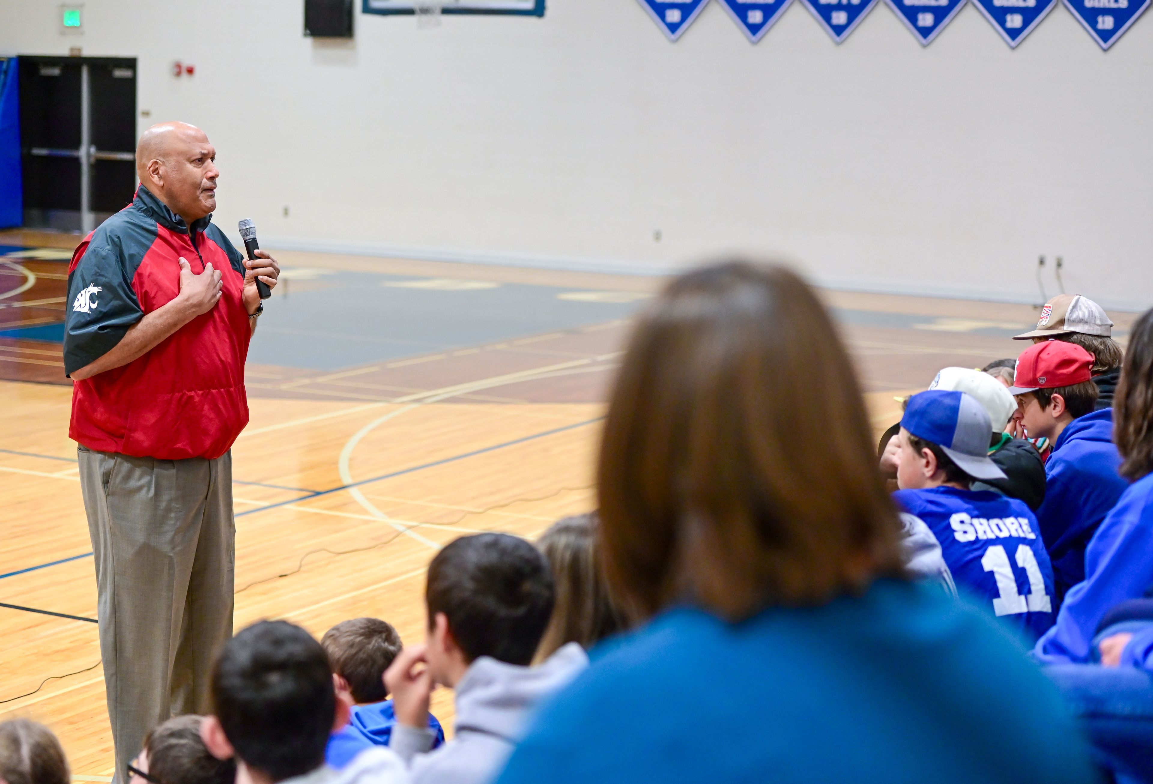 Former NBA and WSU athlete James Donaldson speaks to students at Colton High School about mental health on Tuesday.