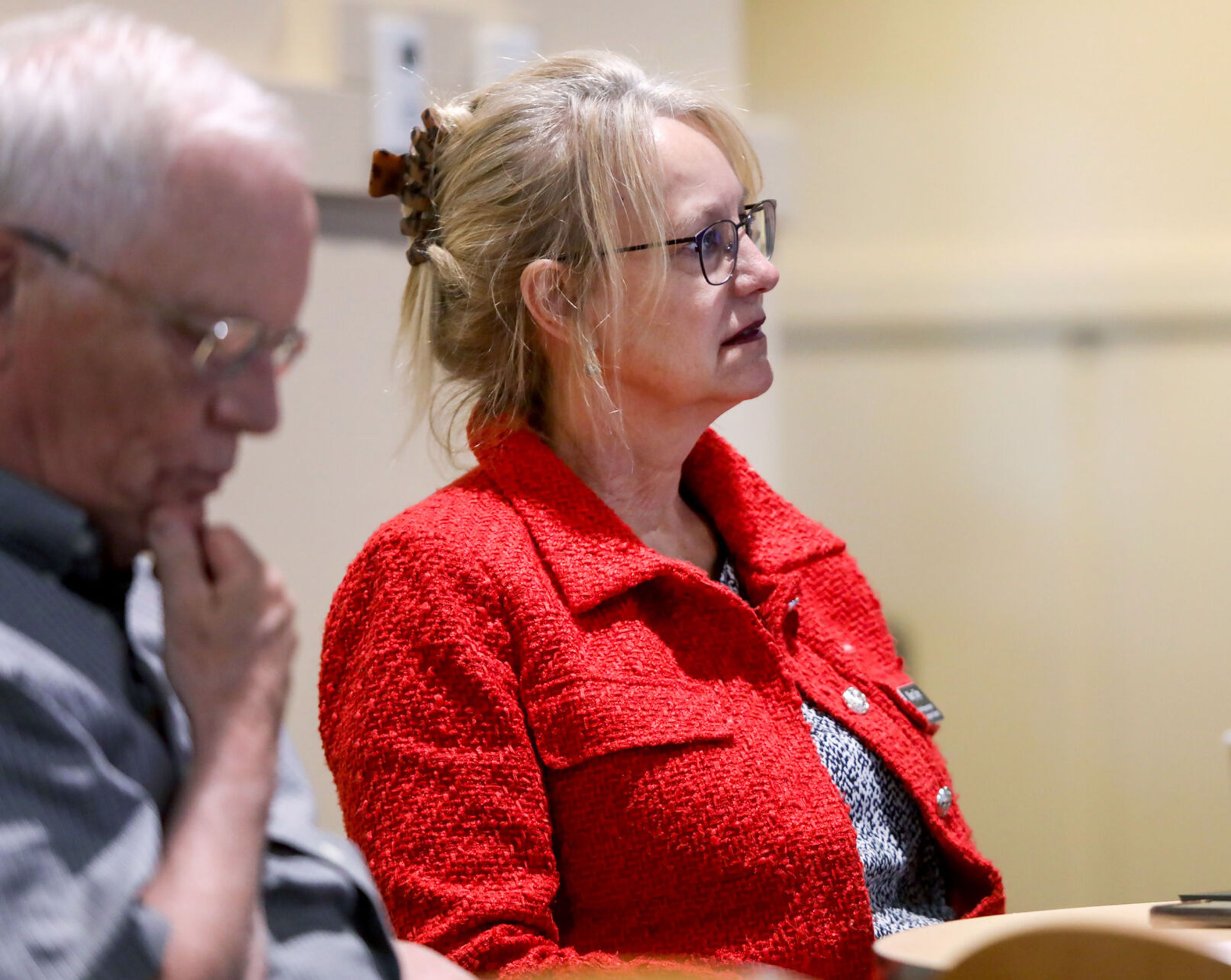 Rep. Mary Dye, R-Pomeroy, right, listens to the Save the Palouse public meeting before speaking at the event on Thursday in Pullman.