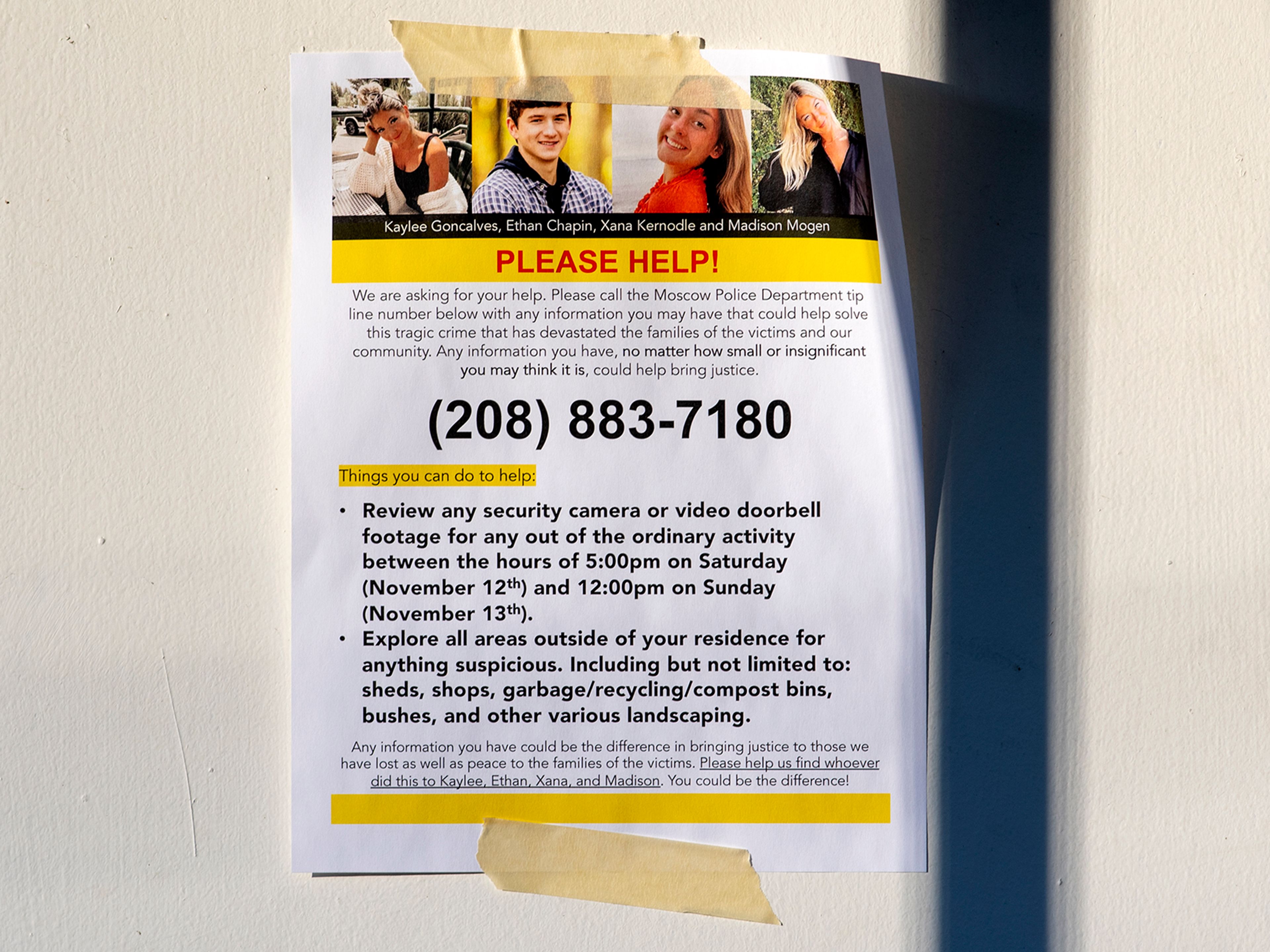 Fliers with the Moscow Police Department tip line number are posted around the city as local authorities are encouraging residents to explore their property and check security footage from the night of the murders.