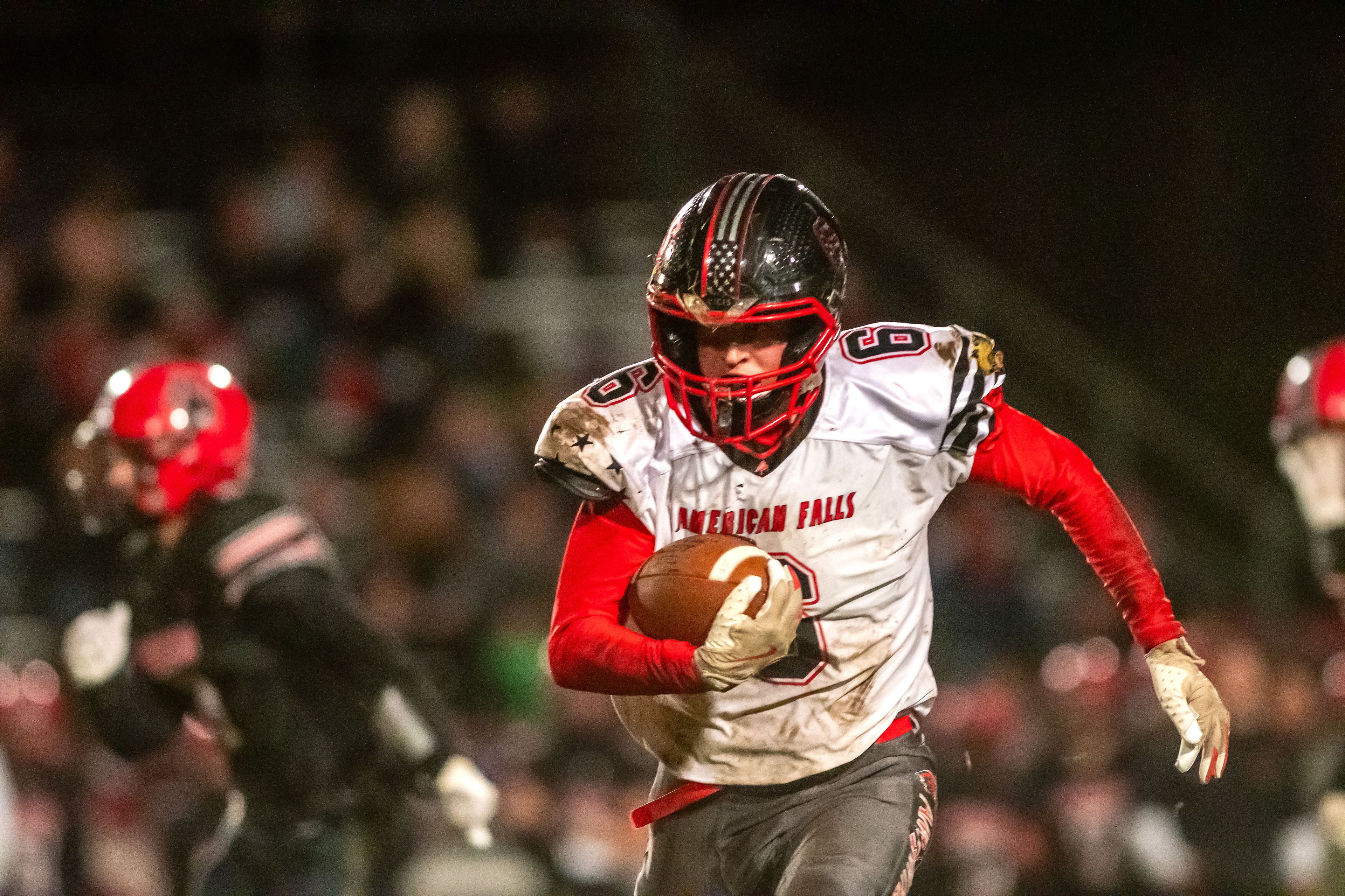 American Falls' Zak Grigg runs the ball for a touchdown against Moscow during an Idaho 4A playoff game Friday in Moscow.