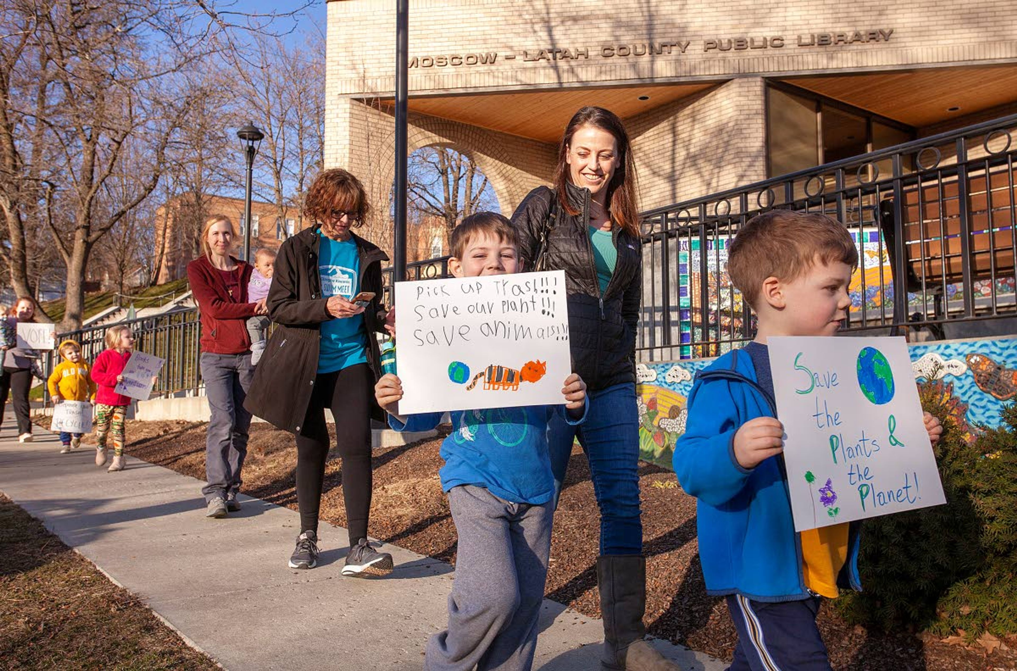 Children march in support of making our world better during "Shape The Future: A Kids Intro To Activism" on Tuesday outside the Moscow Public Library. The event way led by Moscow author Annette Bay Pimentel, who also read the children books about activists. Pimentel's children's book "All The Way To The Top: How One Girl's Fight For Americans With Disabilities Changed Everything" will be released next week.