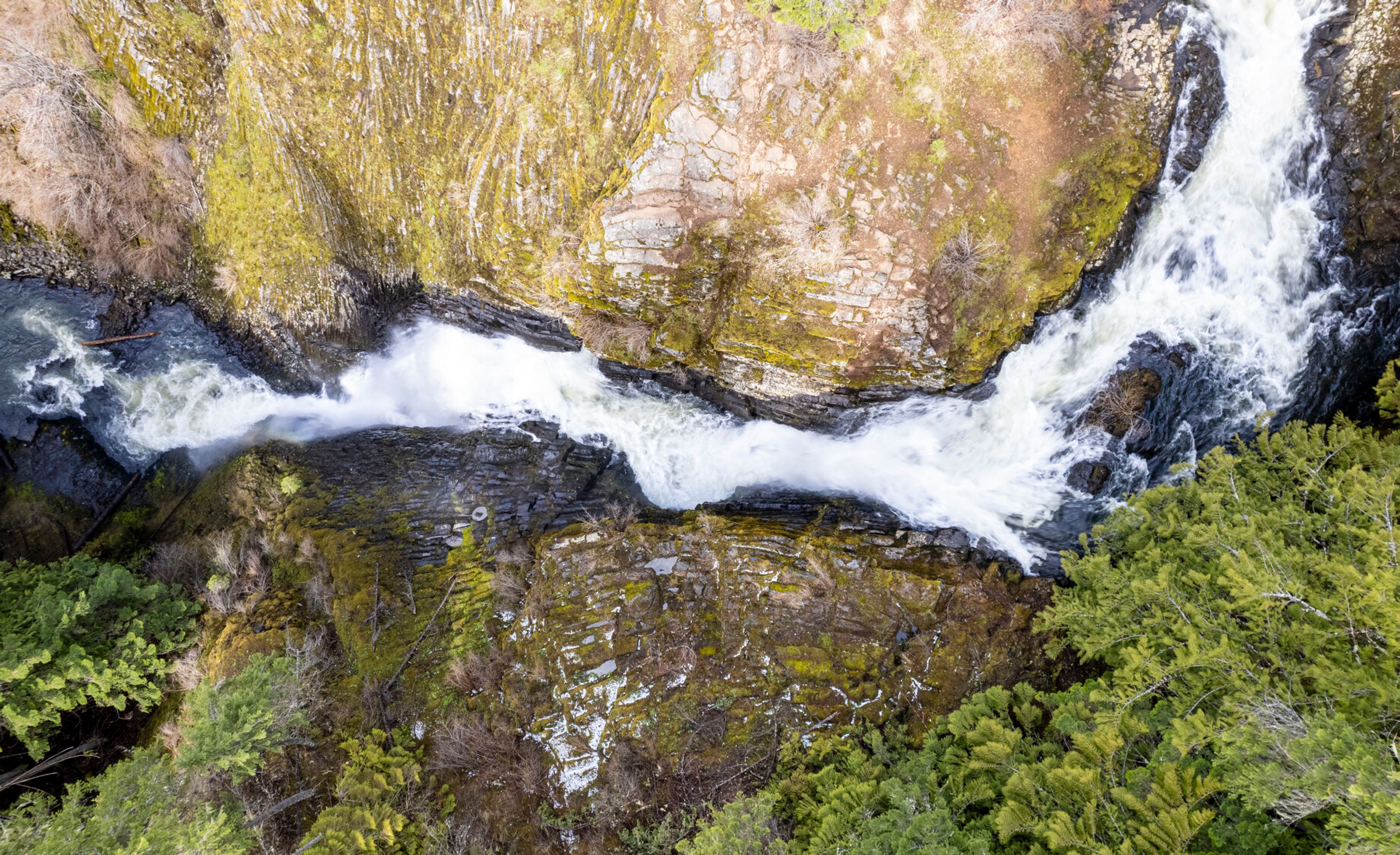 This image captured with a drone shows the lower waterfall of the Elk Creek Falls earlier this spring.