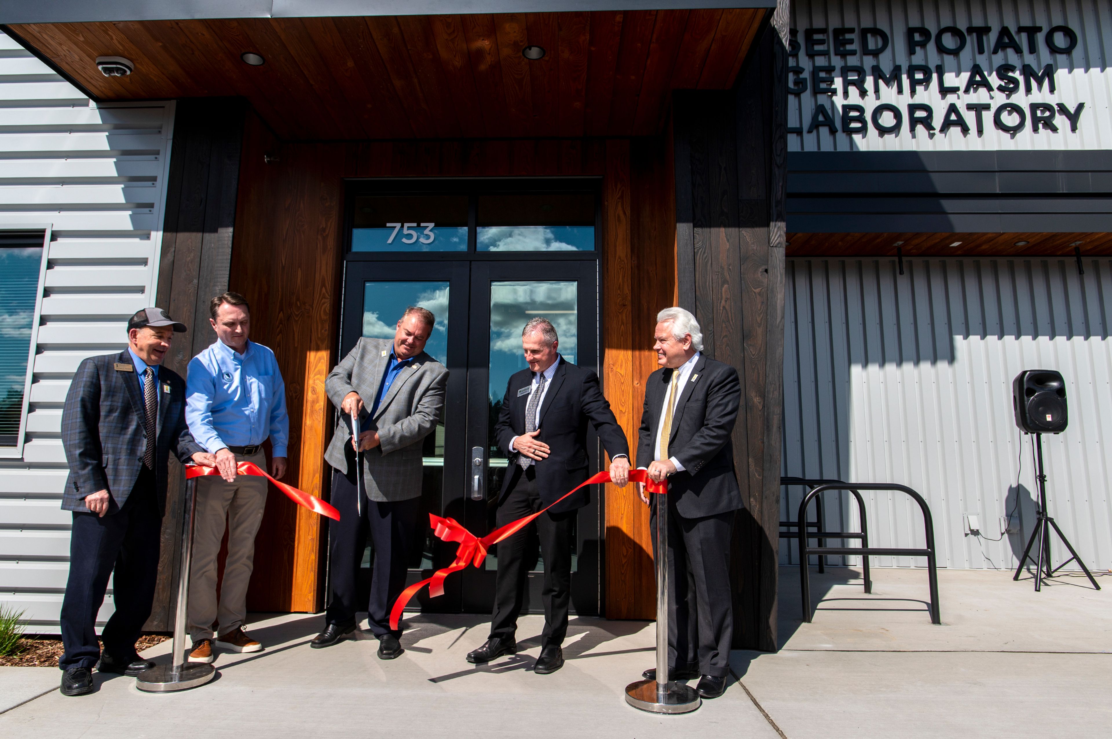 The ribbon is cut at the grand opening of the University of Idaho’s new Seed Potato Germplasm Laboratory on Tuesday afternoon in Moscow.