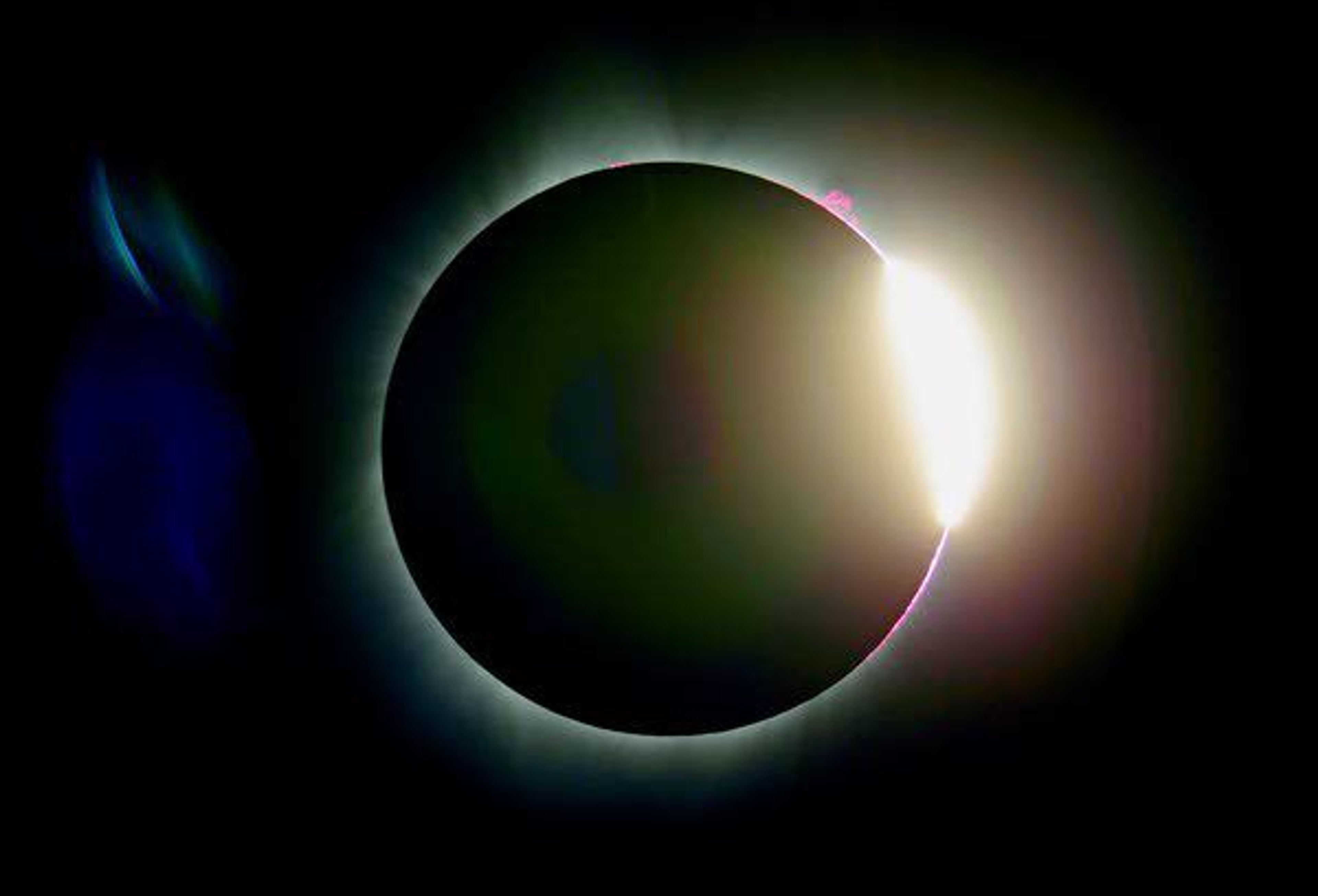 The moon partially covers the sun after a total eclipse Monday near Redmond, Ore.