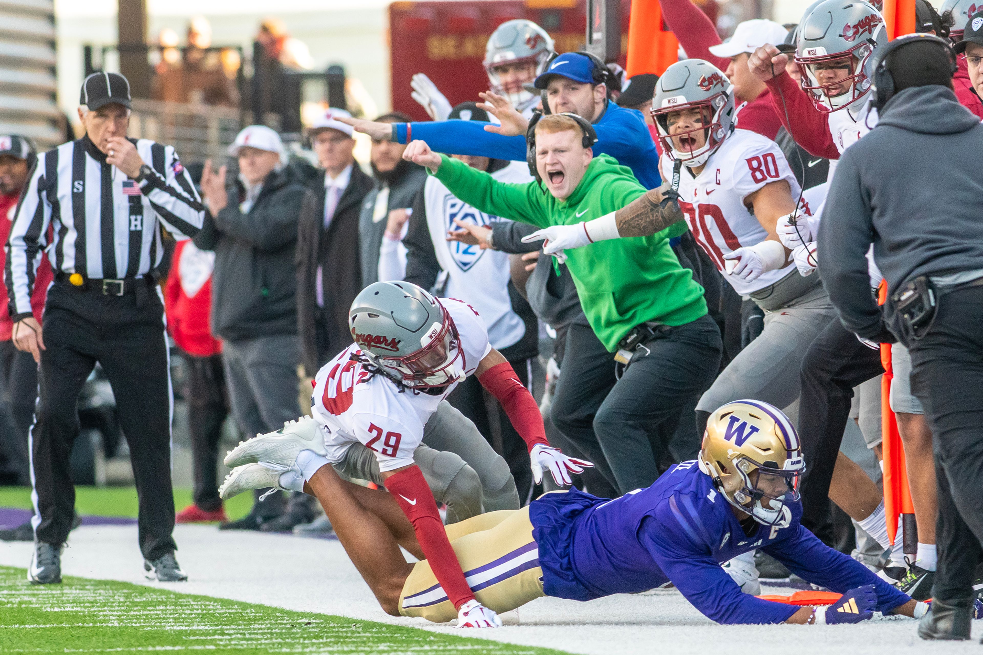 Washington State defensive back Jamorri Colson (29) breaks up a catch intended for Washington wide receiver Rome Odunze (1) during the 2023 Apple Cup in Seattle.