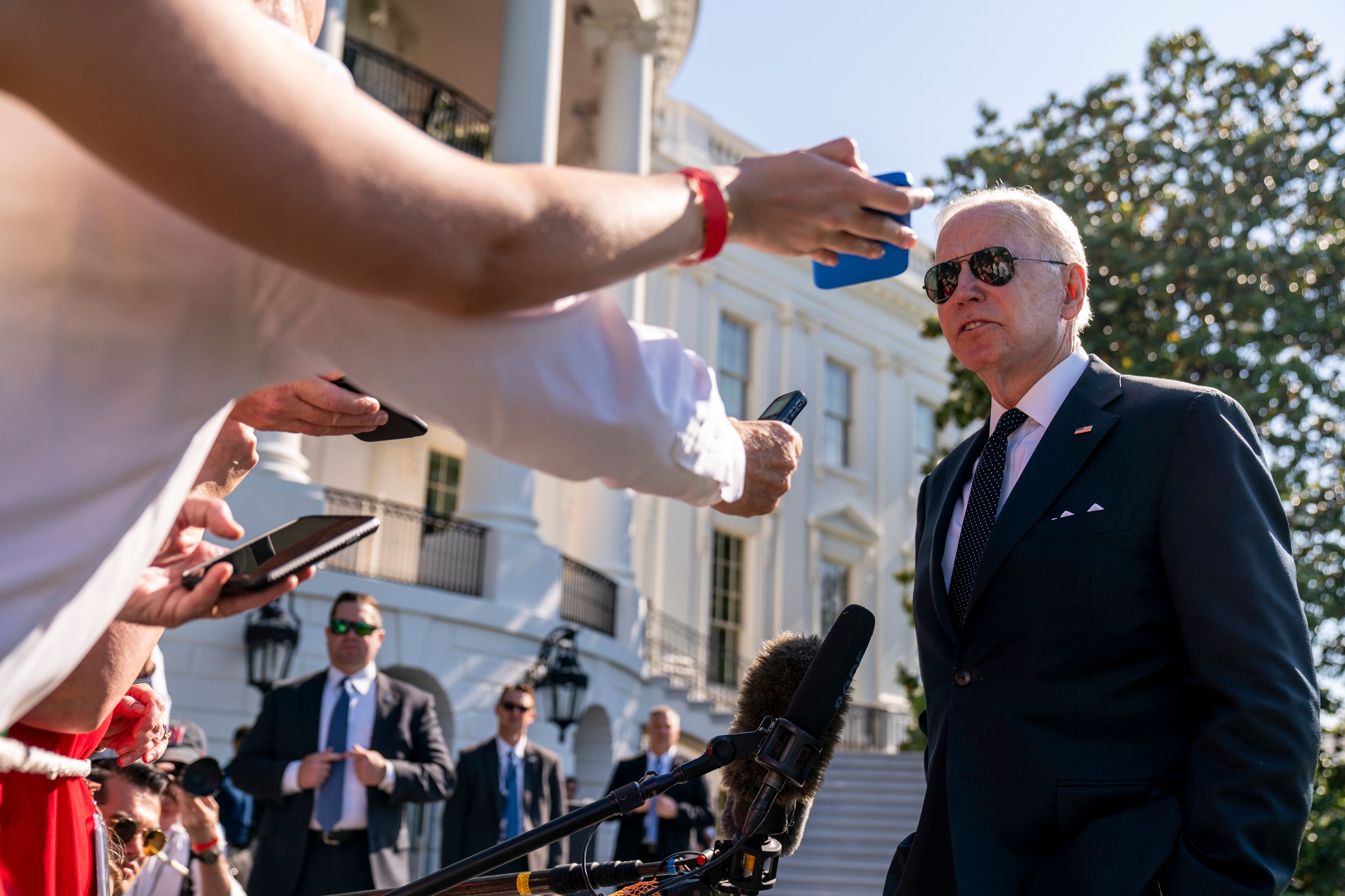 President Joe Biden speaks to members of the media on the South Lawn of the White House in Washington, Monday, May 30, 2022, after returning from Wilmington, Del. (AP Photo/Andrew Harnik)