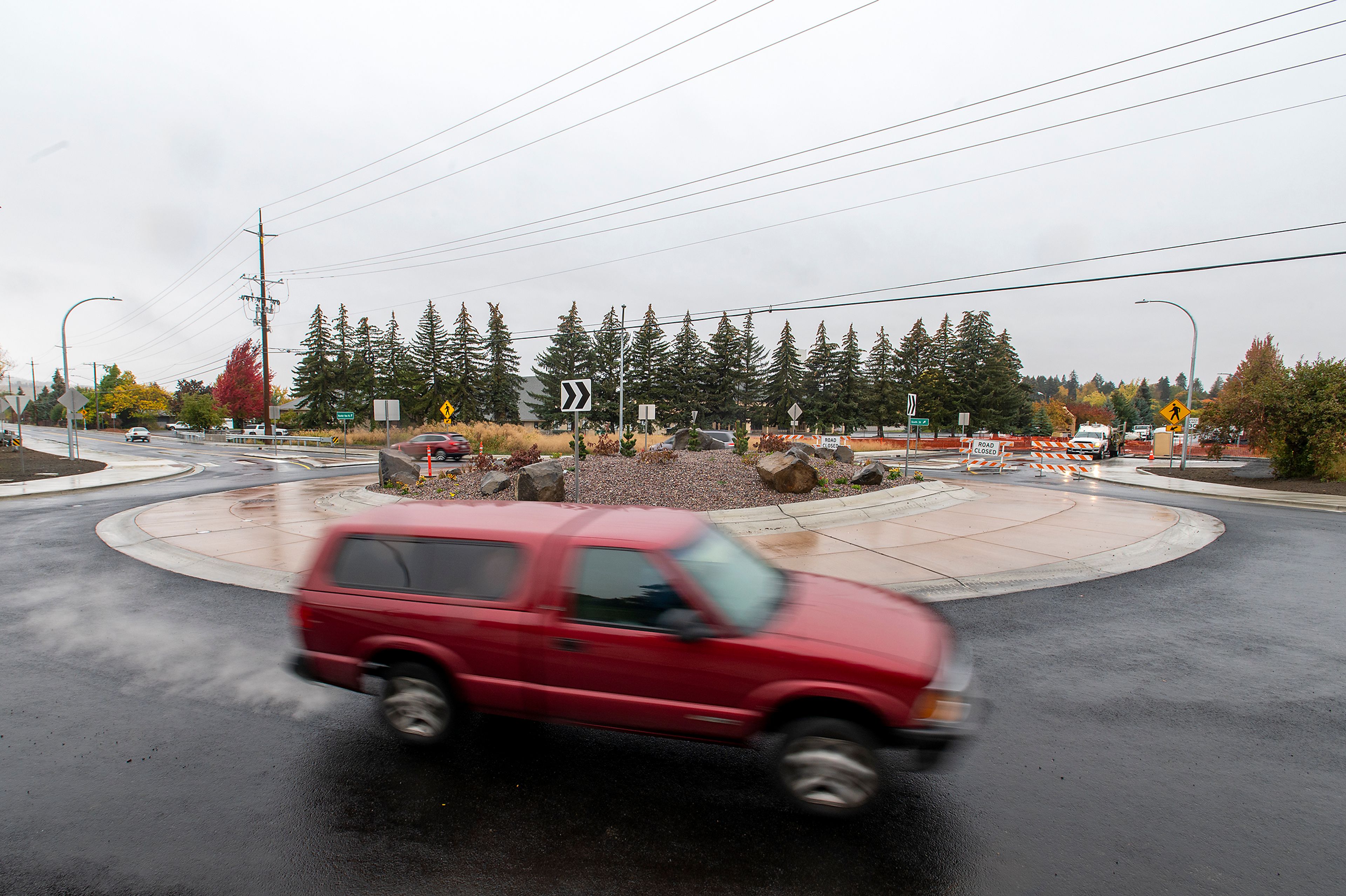 Traffic moves through the new roundabout along Mountain View Road and Sixth Street in Moscow on Monday.