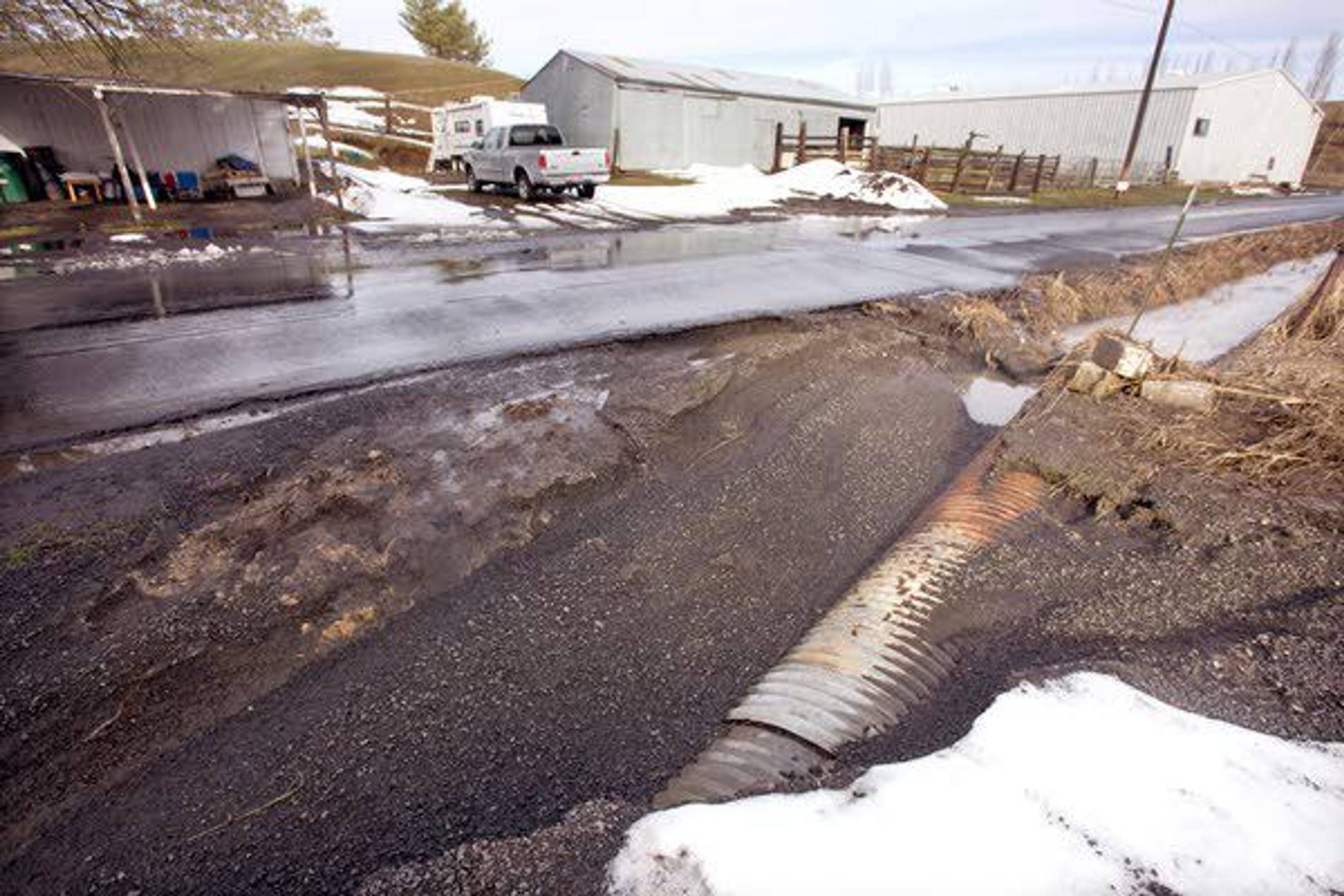 A culvert for a driveway washed out during flooding on Wednesday on North Polk Street Extension north of Moscow.