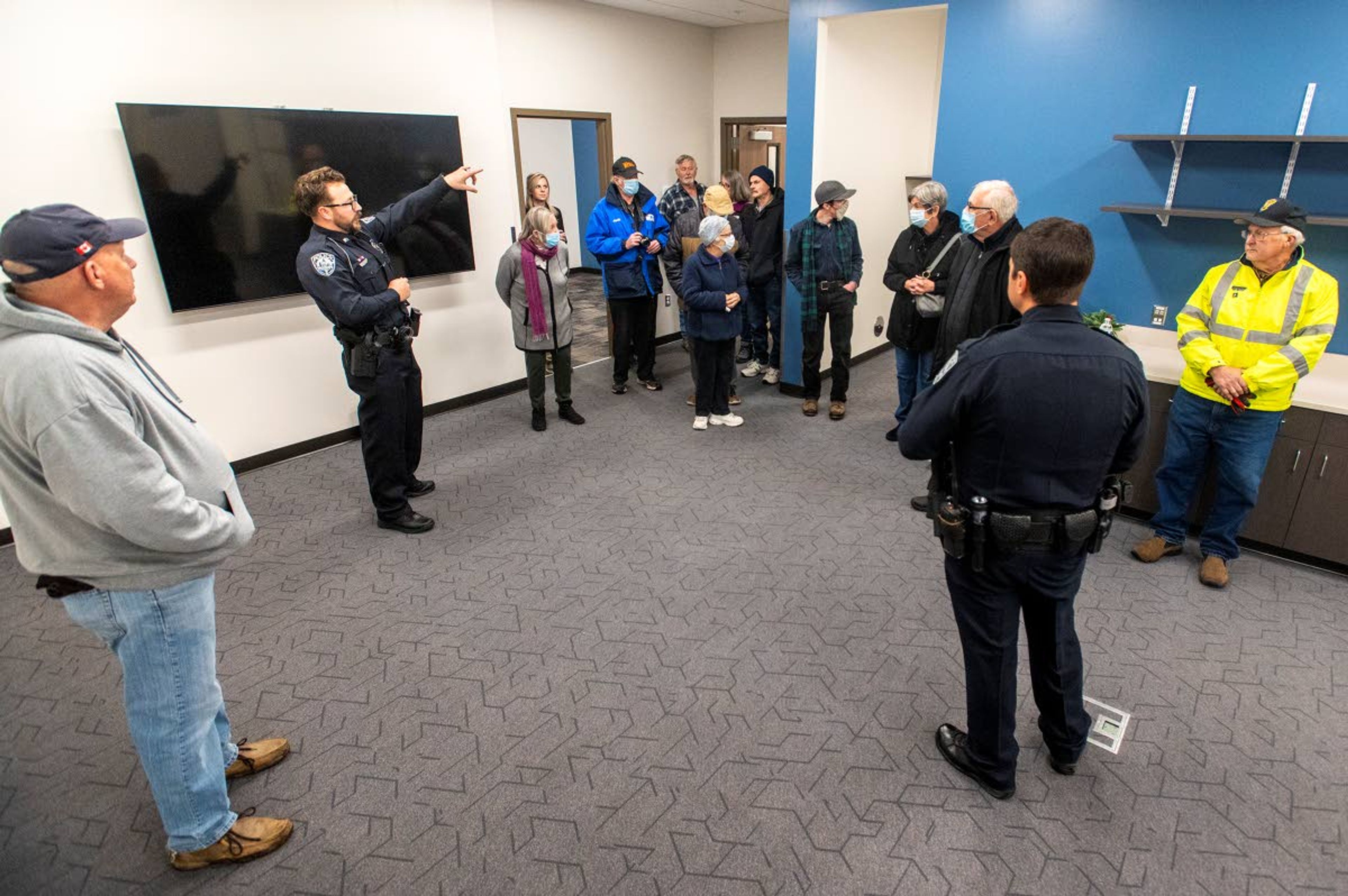 Sgt. Shaine Gunderson gives a tour of the briefing room on Thursday night at Moscow Police Department’s new station.