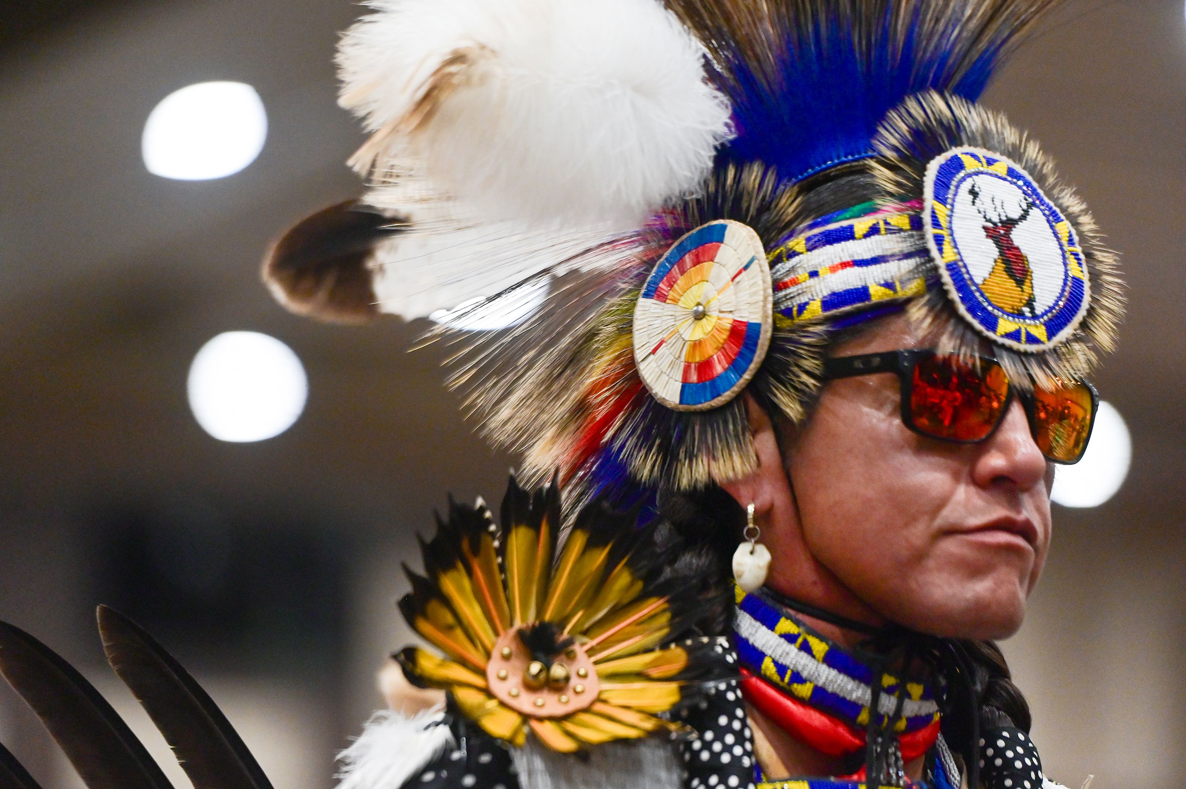 

A dancer wears sunglasses while taking part in a Grand Entry as part of the Hiitem'waq'iswit Dance for Life powwow’s Oct. 12 events in Lewiston last weekend.