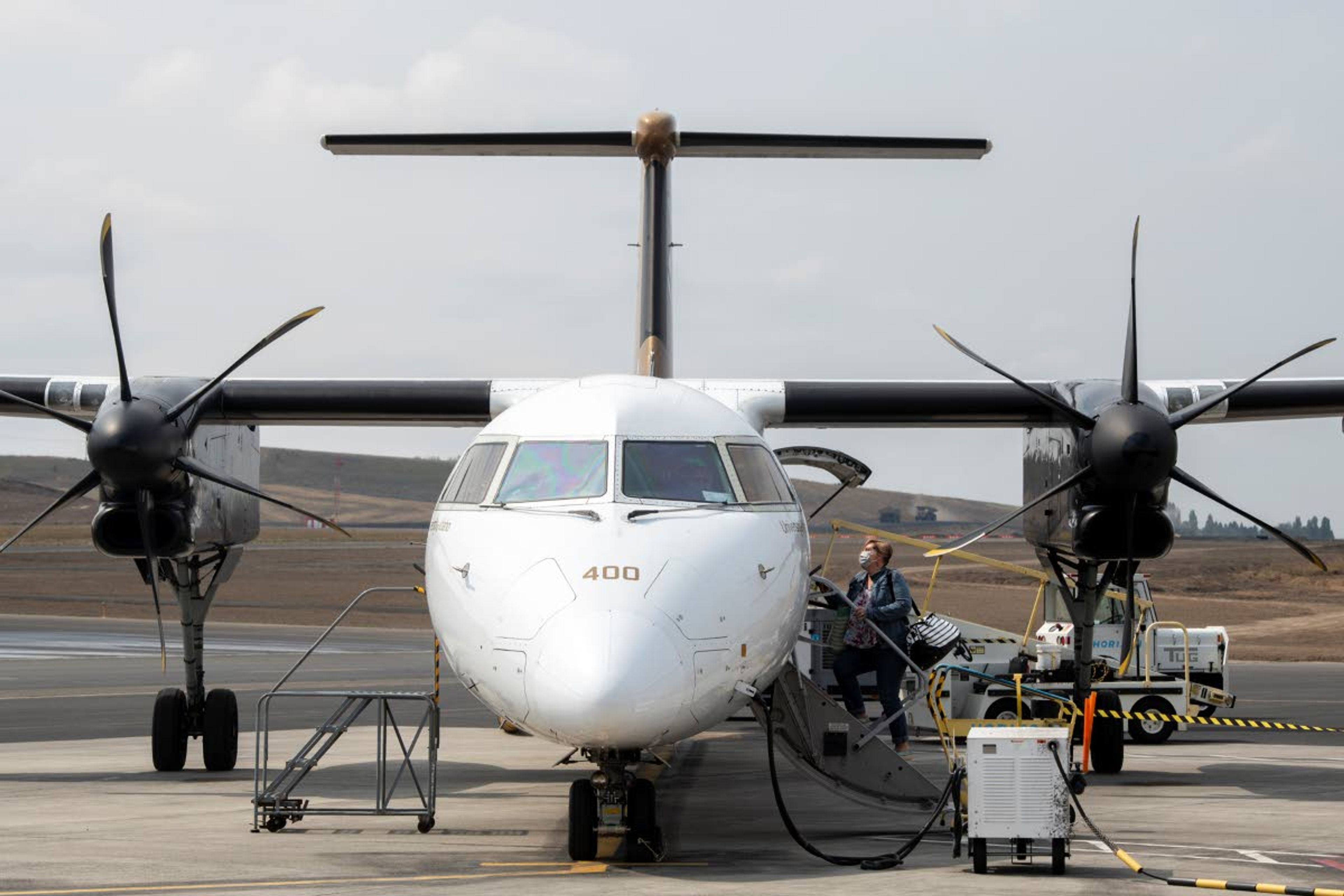 FILE — A passenger boards Flight 2496 to Boise at the Pullman-Moscow Regional Airport in 2021.