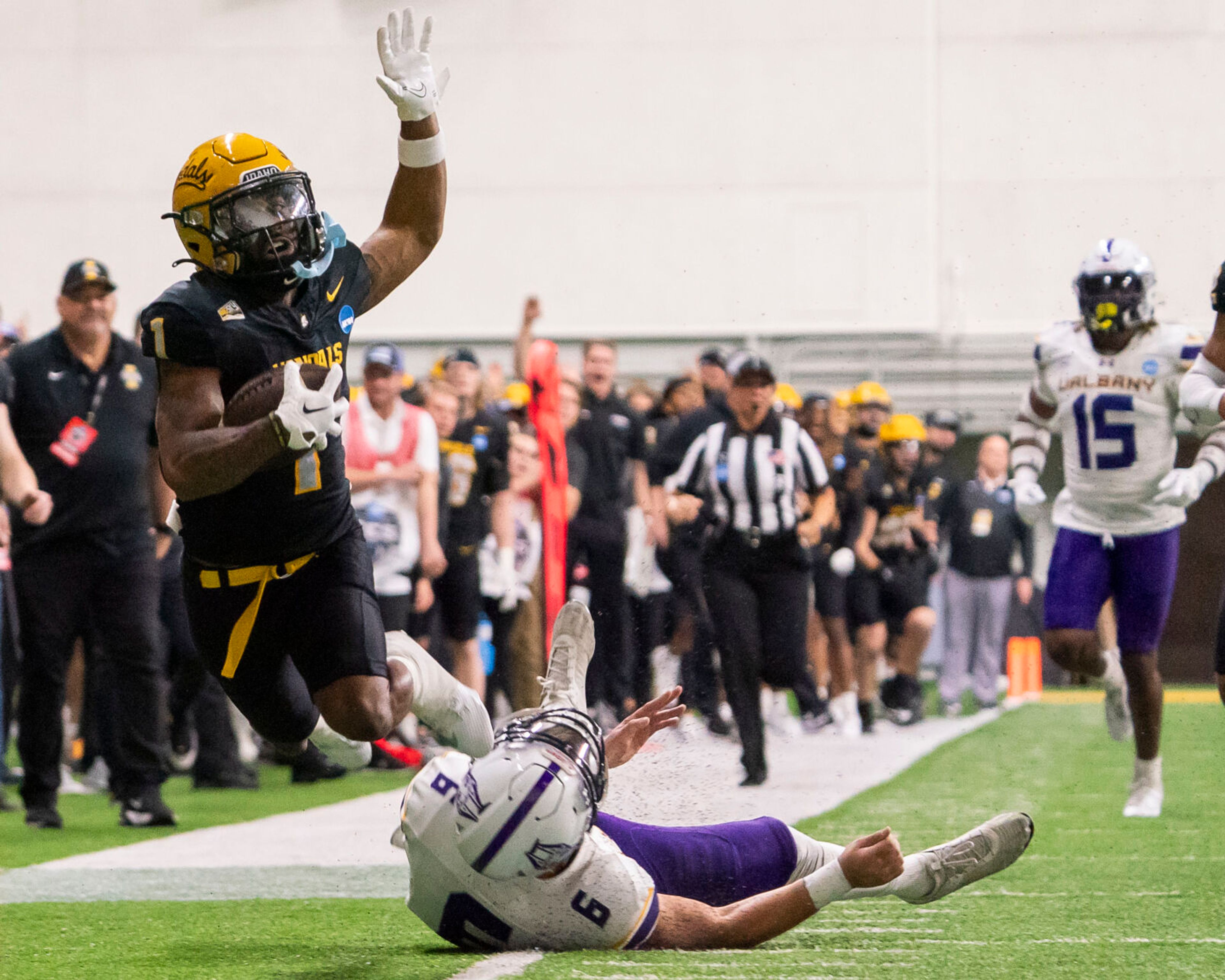 Idaho wide receiver Jermaine Jackson (1) soars out of bounds after returning a punt during a game against Albany in the third round of the 2023 Division I FCS playoffs on Dec. 9 at the P1FCU Kibbie Dome in Moscow.