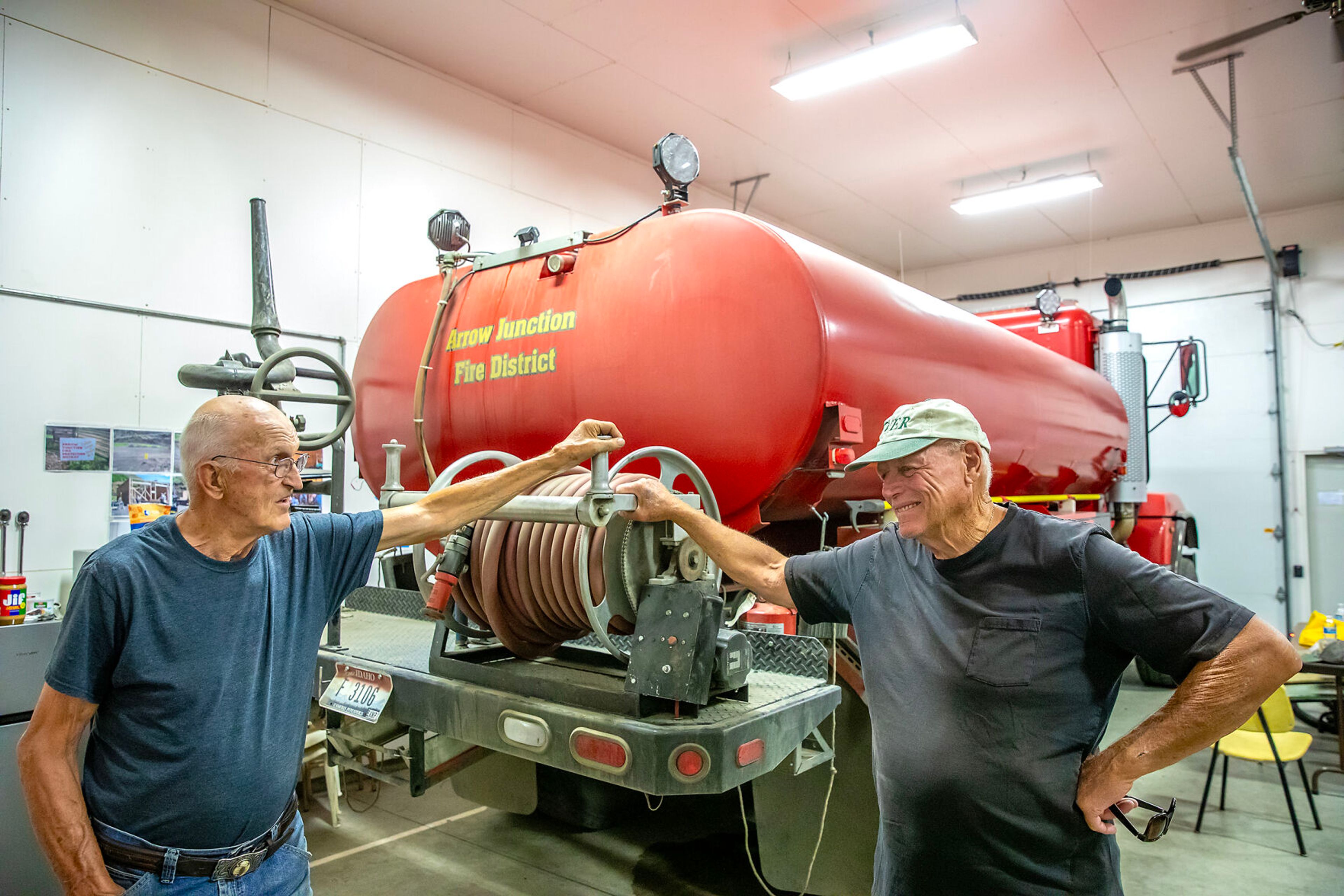 Gene Wightman, left, and LuVerne Grussing stand inside the Arrow Junction Fire Protection District on Friday.