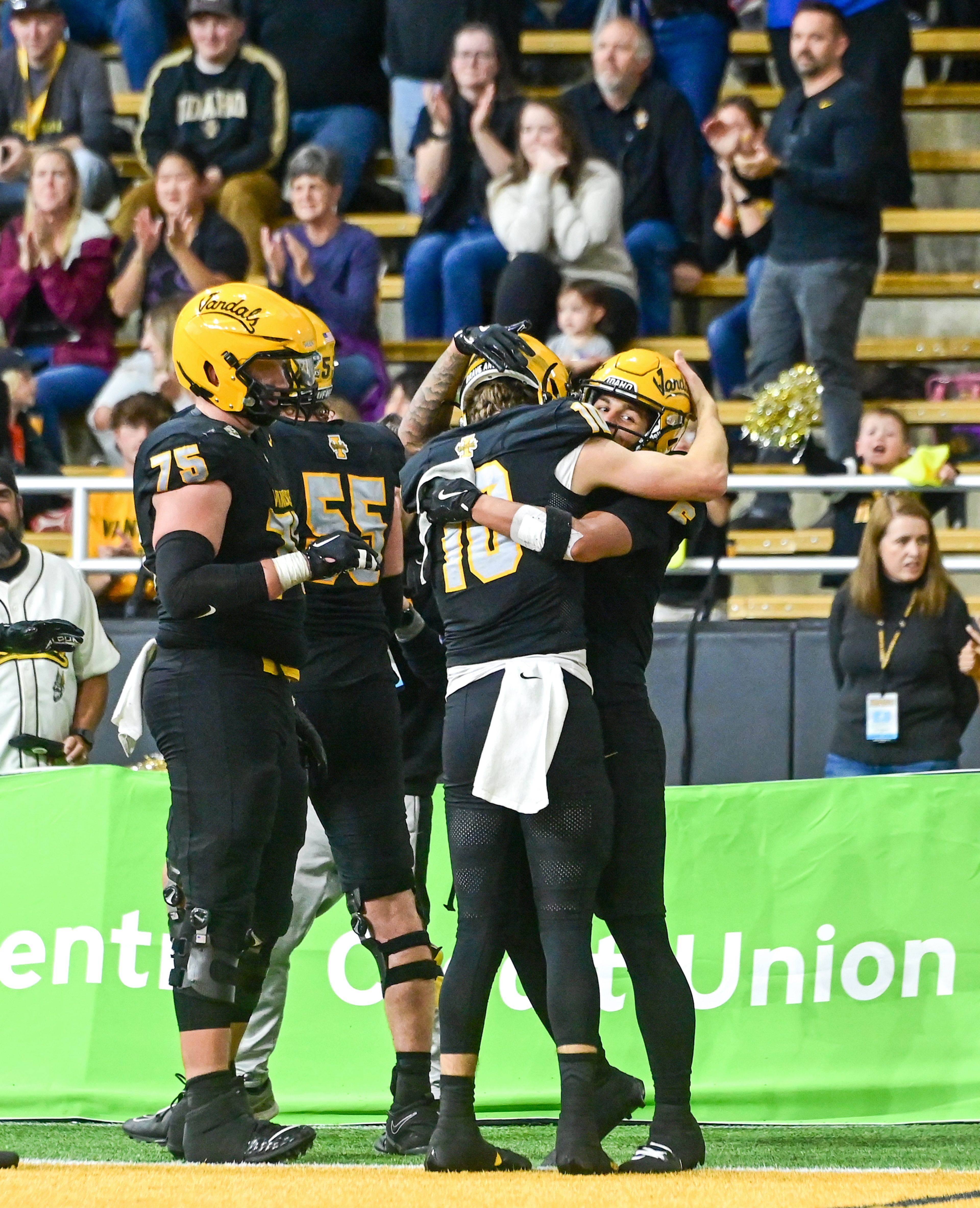 Idaho quarterback Jack Wagner embraces Idaho wide receiver Jordan Dwyer after Dwyers touchdown Saturday at the P1FCU Kibbie Dome in Moscow.,