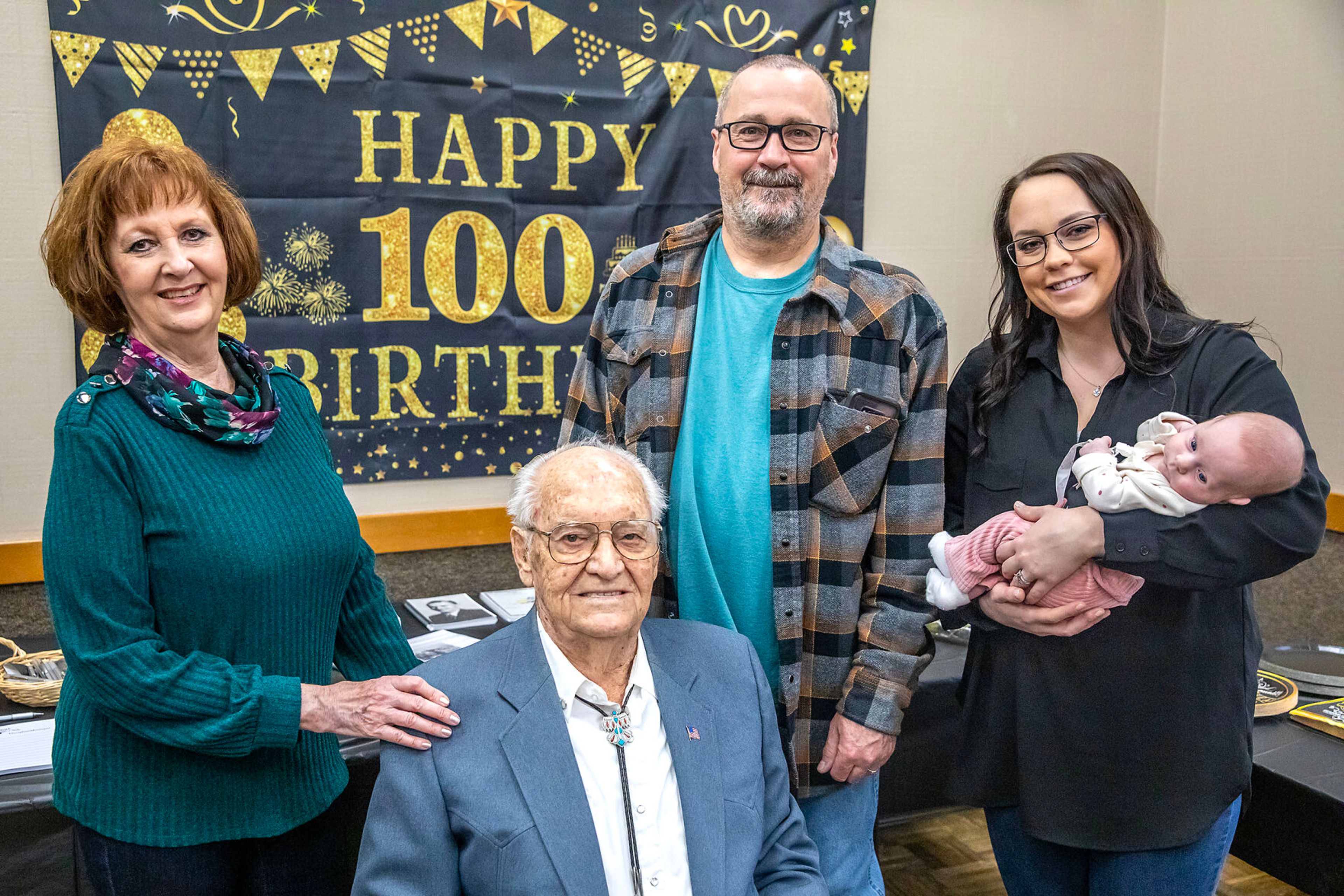 Five generations, including Floyd Thomason (center), his daughter Susan Hall, grandson Brad Geagley, great granddaughter McKenzie Funke, and great great granddaughter Wrenlee Funke, 2 months, are pictured at Thomason’s 100th birthday party Saturday at the Lewiston Community Center.