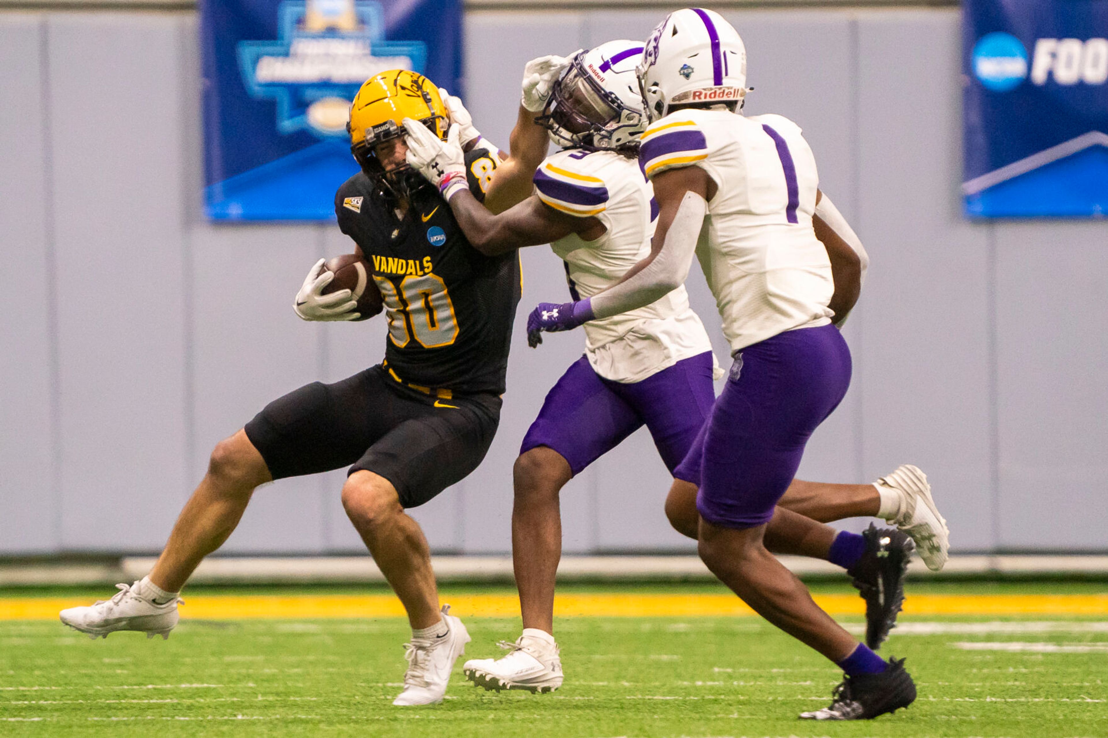 Idaho Vandals wide receiver Hayden Hatten (80) attempts to gain extra yards after making a catch during their game against Albany in the third round of the 2023 Division I FCS Football Championship on Saturday inside the Kibbie Dome in Moscow.