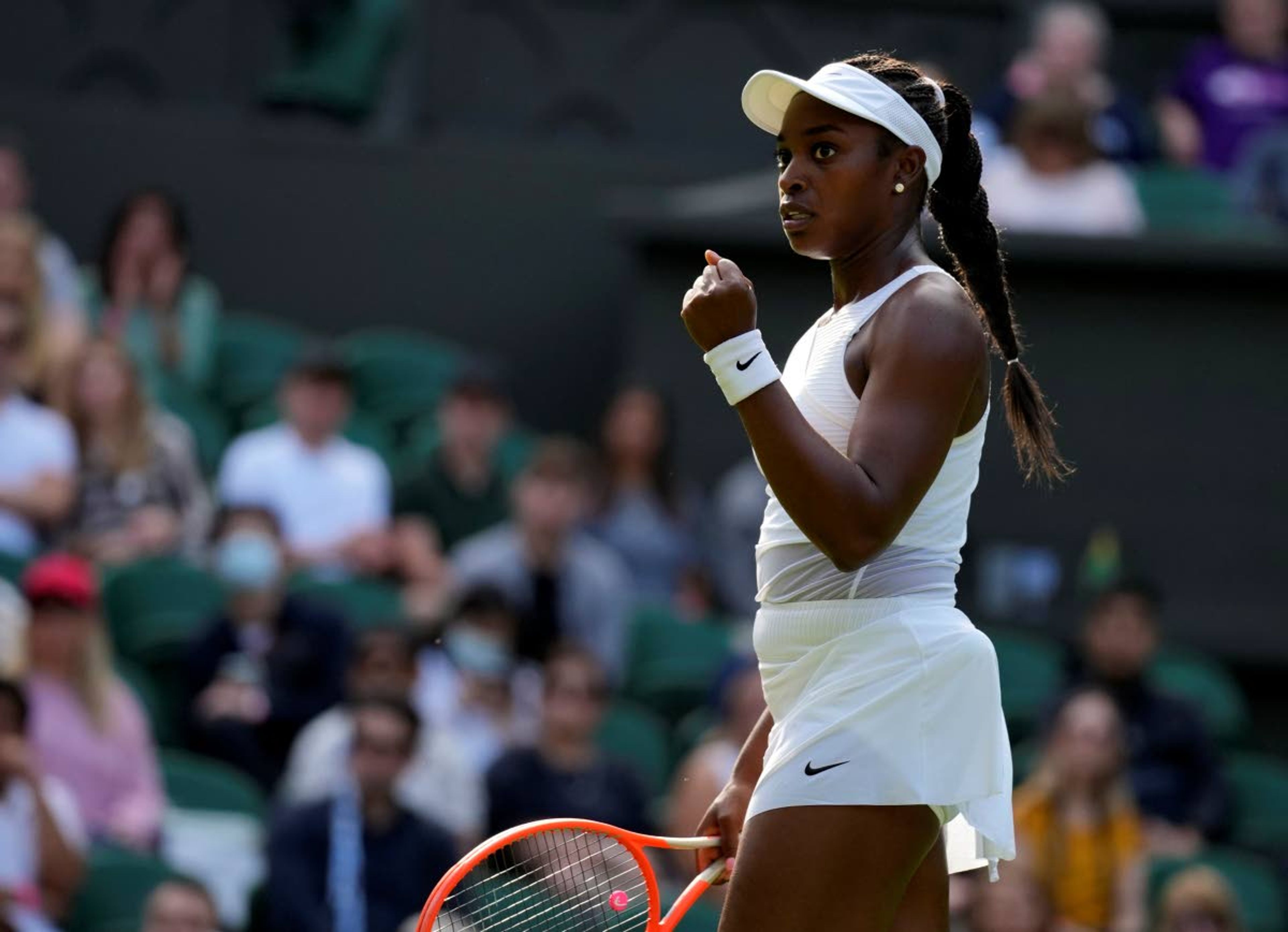 Sloane Stephens of the US celebrates winning a point against Czech Republic's Petra Kvitova during the women's singles match on day one of the Wimbledon Tennis Championships in London, Monday June 28, 2021. (AP Photo/Kirsty Wigglesworth)