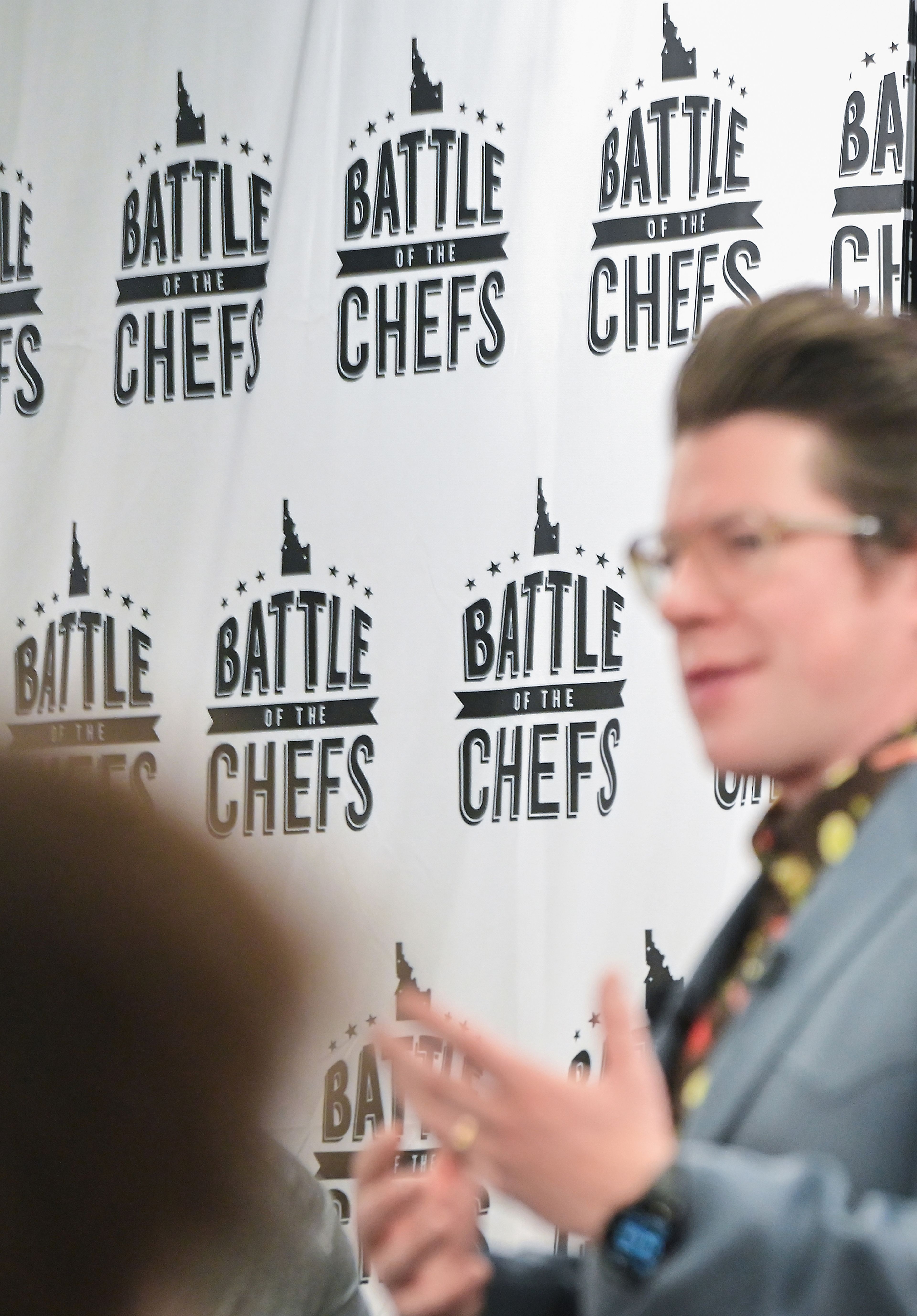 Celebrity chef Justin Warner speaks to those gathered for the judging of the Battle of the Chefs Wednesday at The Eatery on the University of Idaho campus in Moscow.