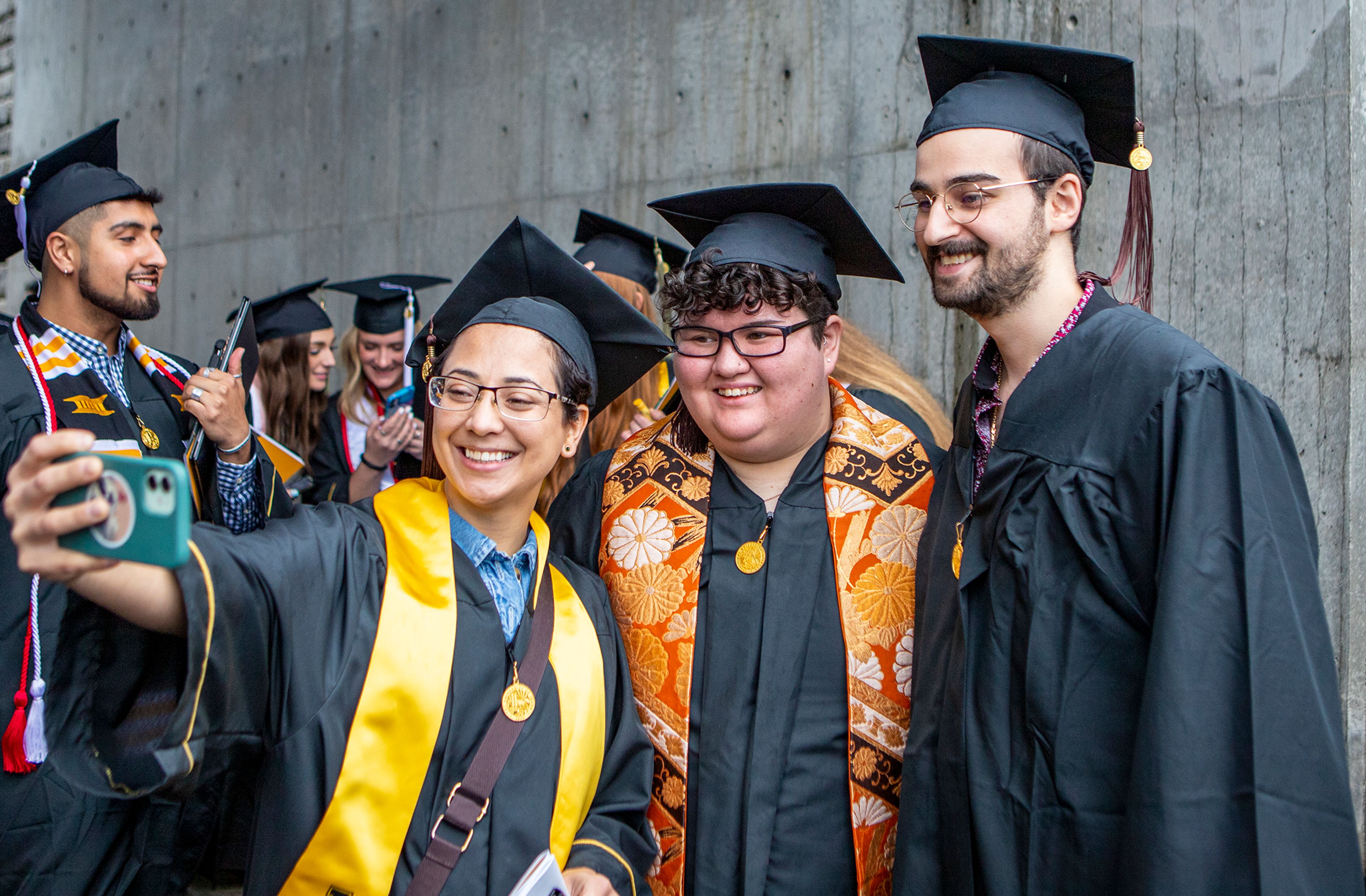 A group of friends pose for a selfie Saturday morning after the University of Idaho’s 2022 Spring Commencement Ceremony at the Kibbie Dome in Moscow.