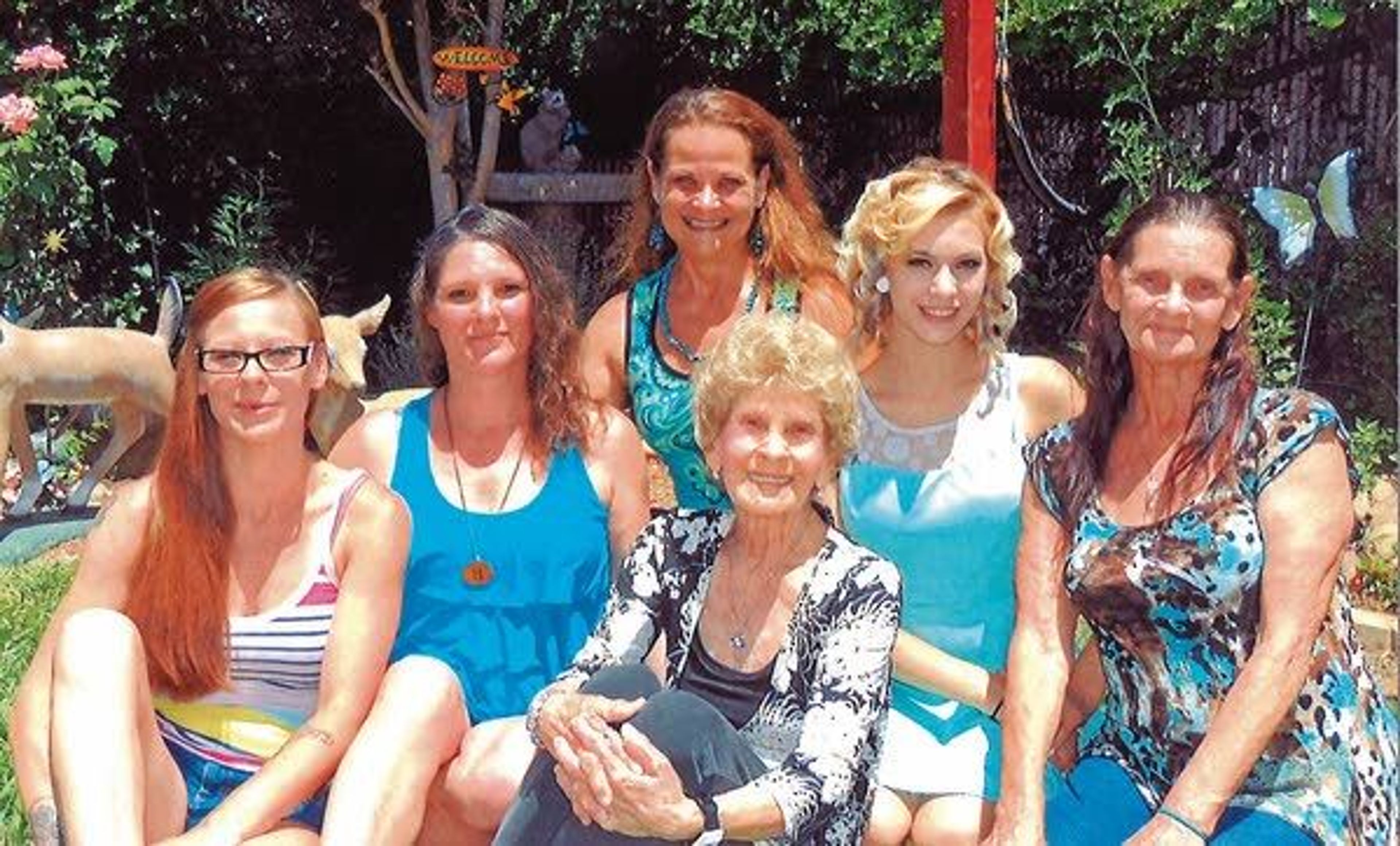 Belinda Niebuhr (second from left) celebrates with her family after her youngest daughter, Kayleigh Patterson (second from right), graduated from high school in Sacramento, Calif., in 2014.