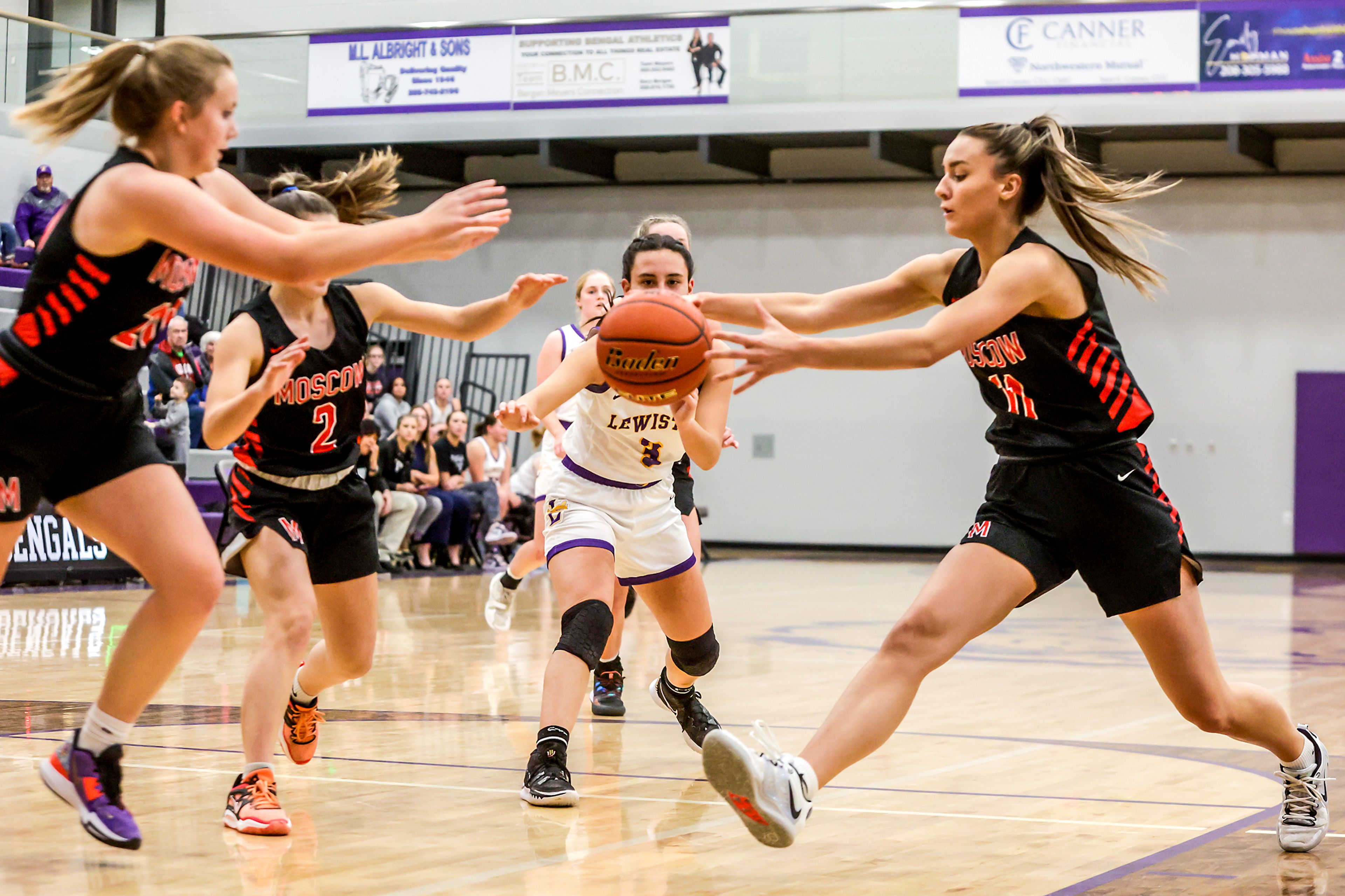 Moscow guard Maya Anderson jumps in to steal a pass thrown by Lewiston guard Sydney Arellano in Lewiston on Wednesday.