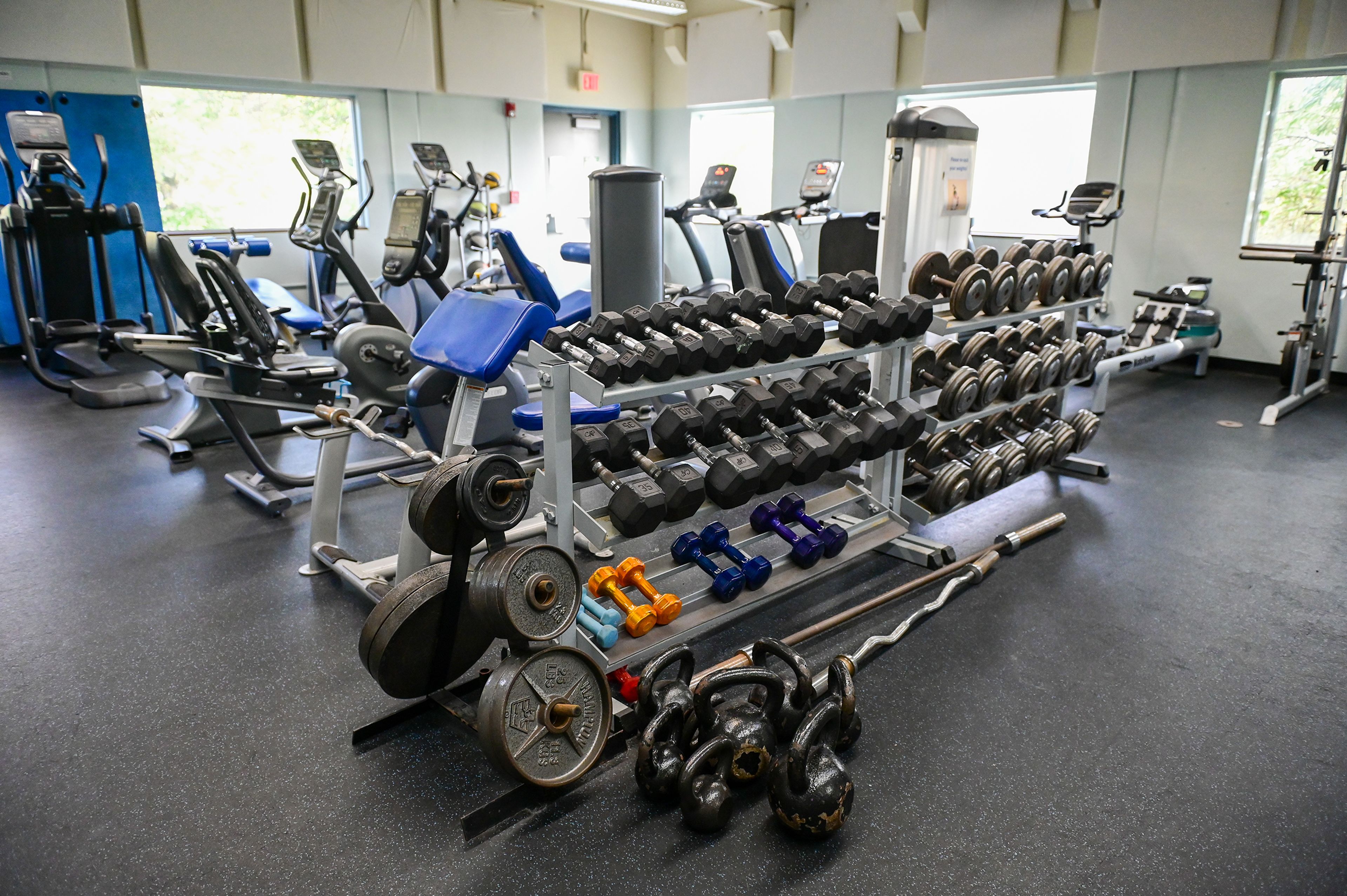 Exercise equipment, including free weights, elliptical machines, treadmills and recumbent bicycles, sit in the fitness room Thursday at the Pullman Aquatic & Fitness Center.