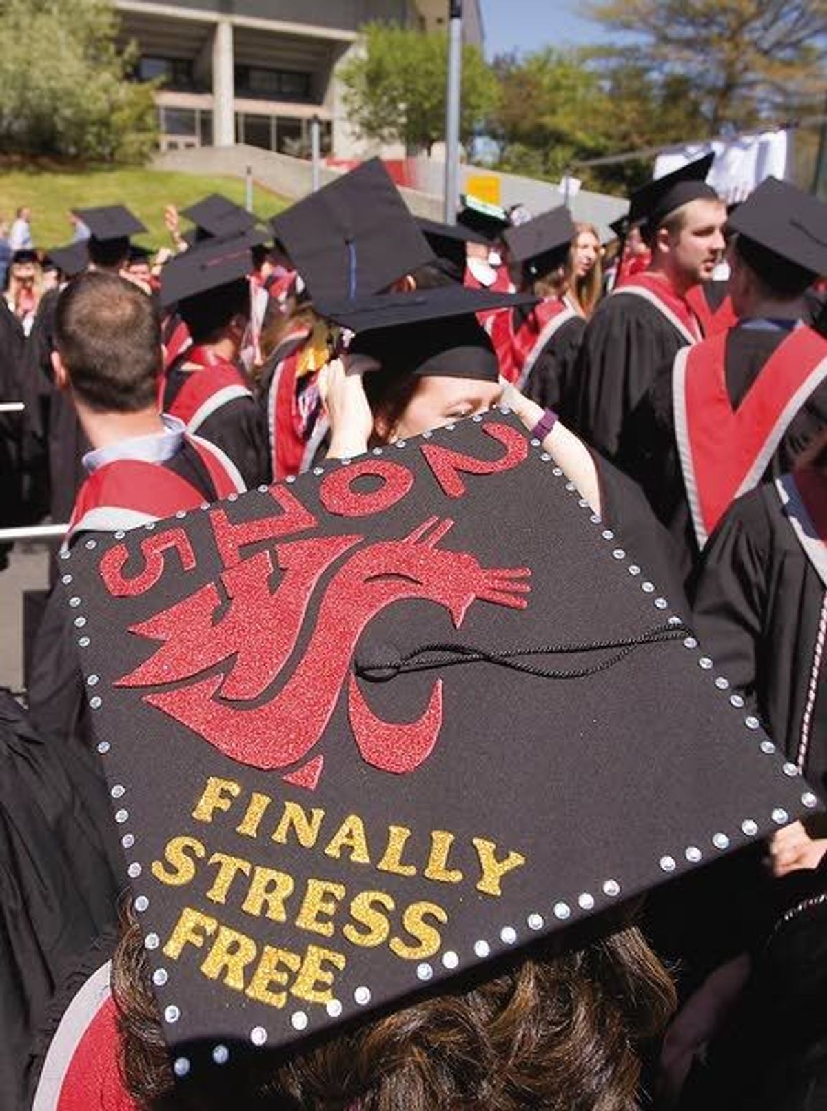 WSU graduates celebrate the day, part of school's largest cl...