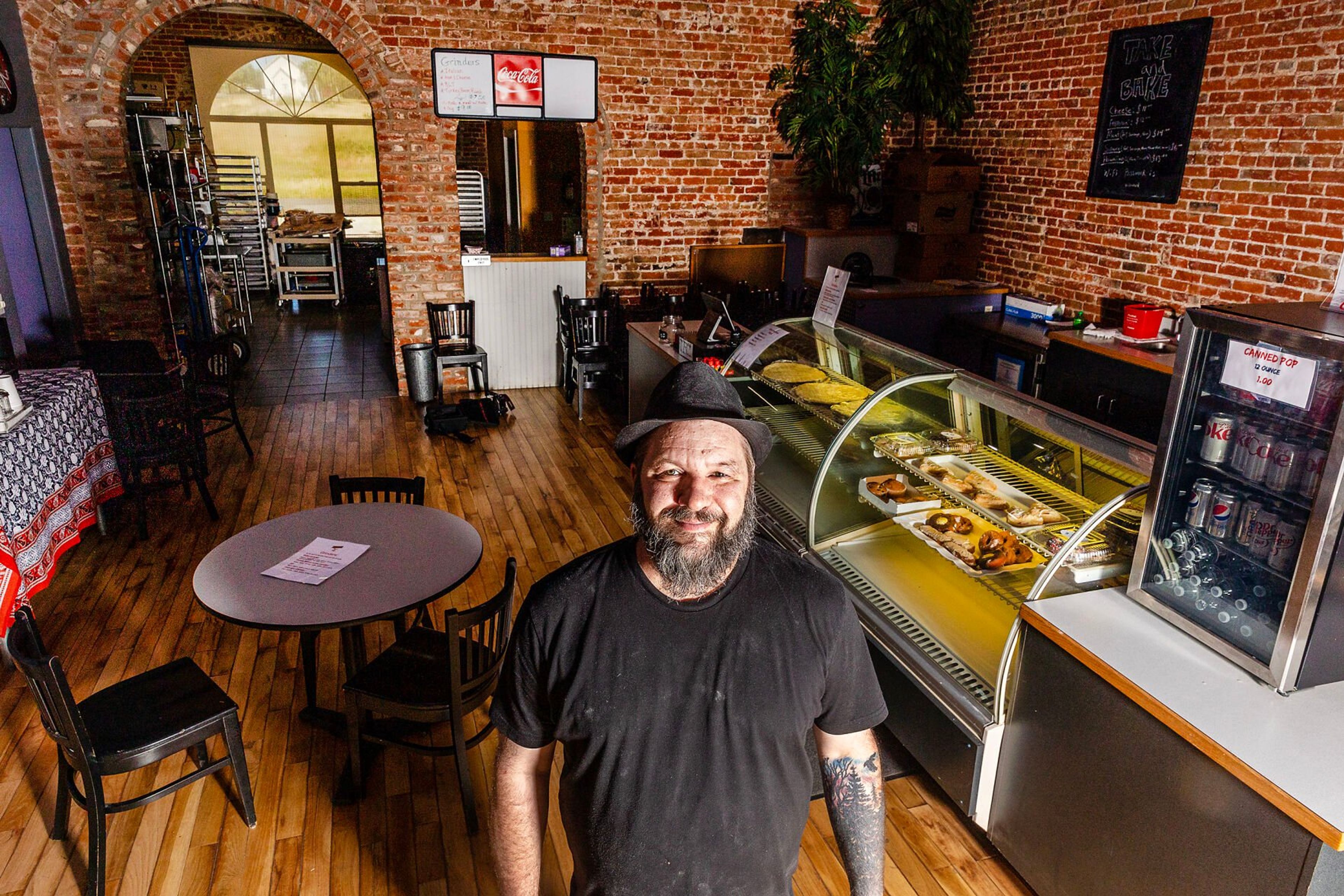 Eric "Preston" Montgomery stands in his store Uniontown General for a photo Wednesday in Uniontown.