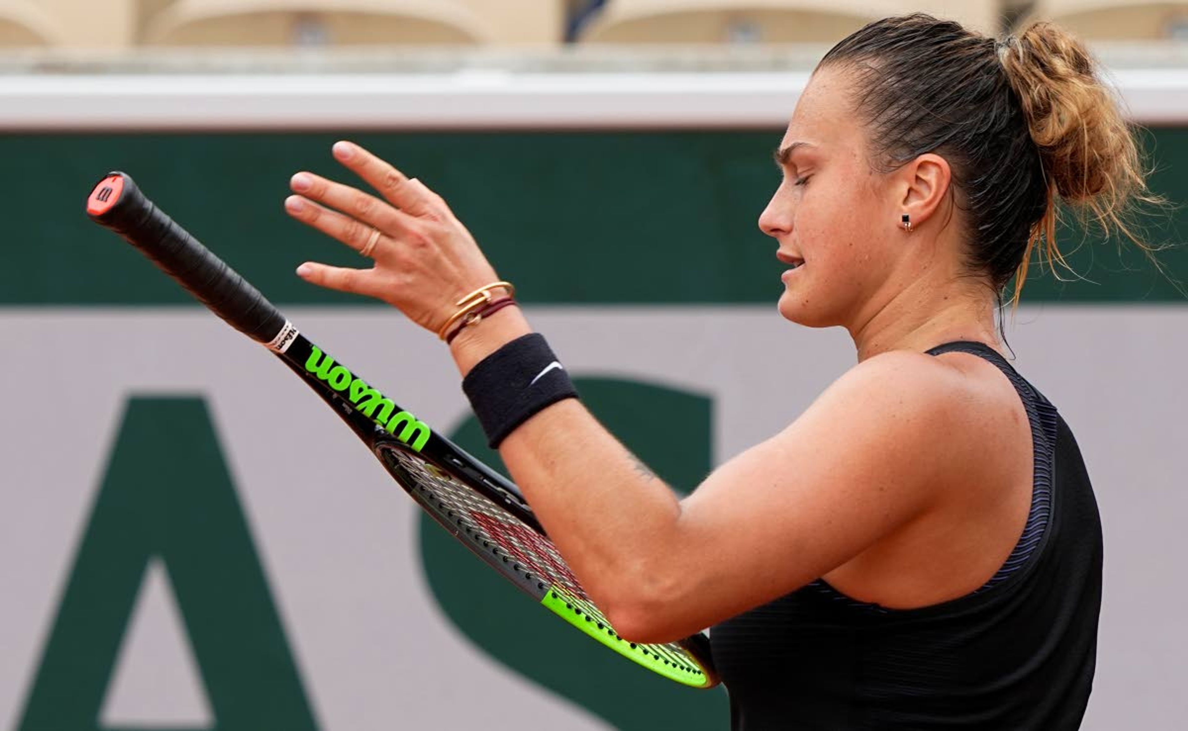 Belarus's Aryna Sabalenka reacts after losing a point against Russia's Anastasia Pavlyuchenkova during their third round match on day 6, of the French Open tennis tournament at Roland Garros in Paris, France, Friday, June 4, 2021. (AP Photo/Michel Euler)