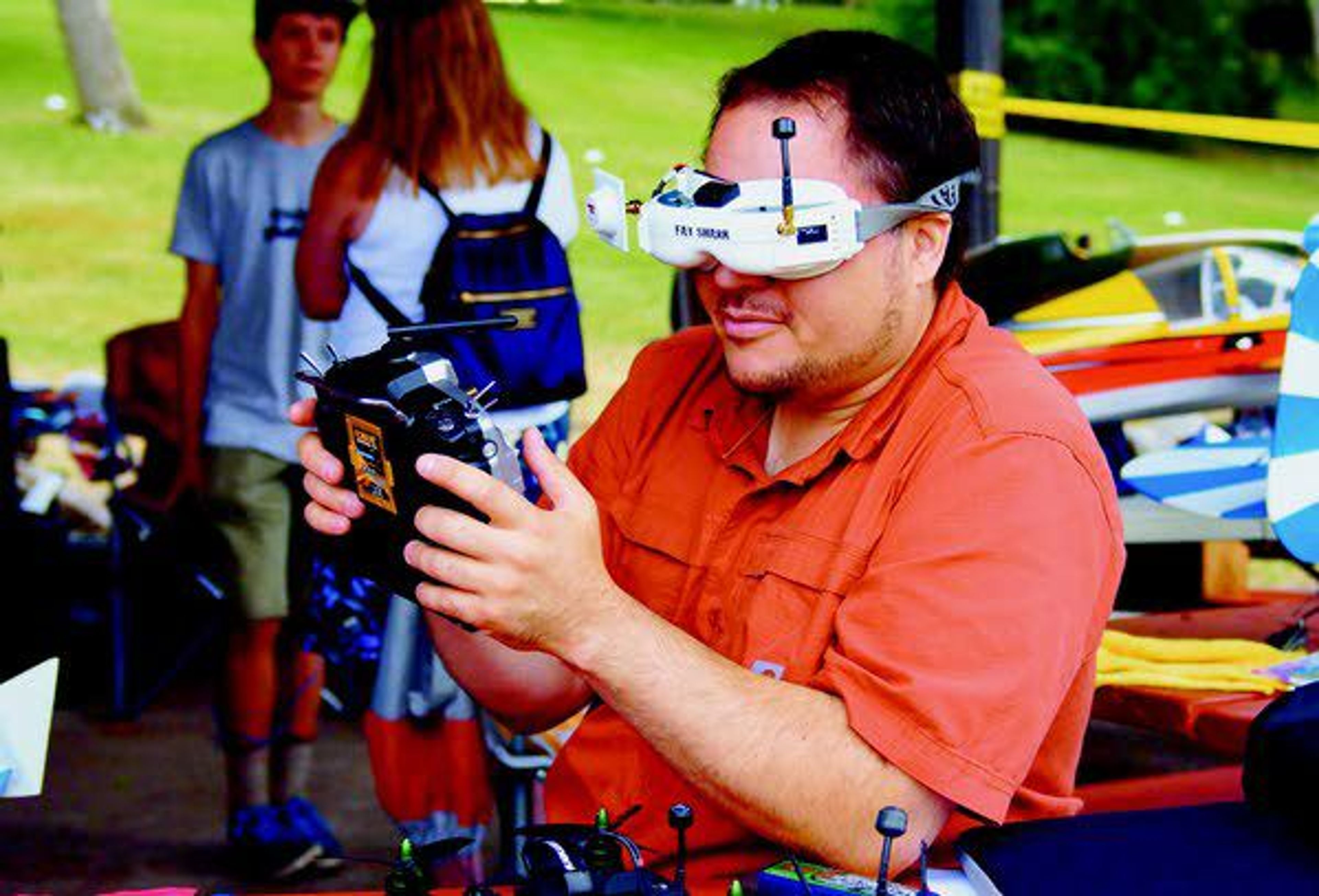 Drone pilot Greg Kelley tests the operation of the camera and first person view (FPV) goggles before racing Saturday morning at Pullman's Kruegel Park.