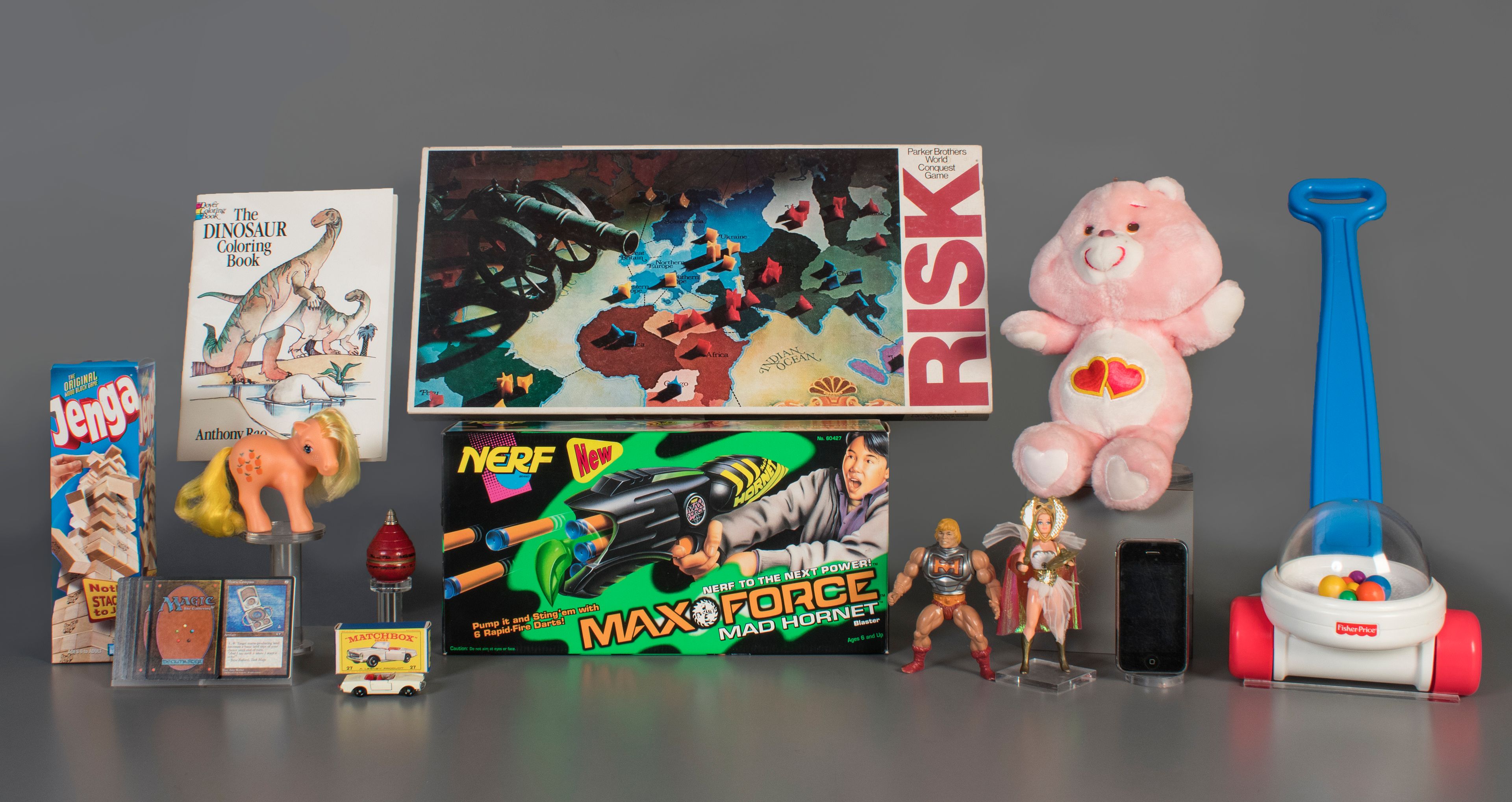 The 2019 finalists are, from left to right, Jenga, Magic the Gathering, My Little Pony, Coloring Book, Matchbox Cars, Top, Nerf Blaster, Risk, Masters of the Universe, Care Bears, Smartphone, and Fisher-Price Corn Popper. The smartphone is being considered for induction into the National Toy Hall of Fame this year in recognition of the way it has changed how people of all ages play and interact.