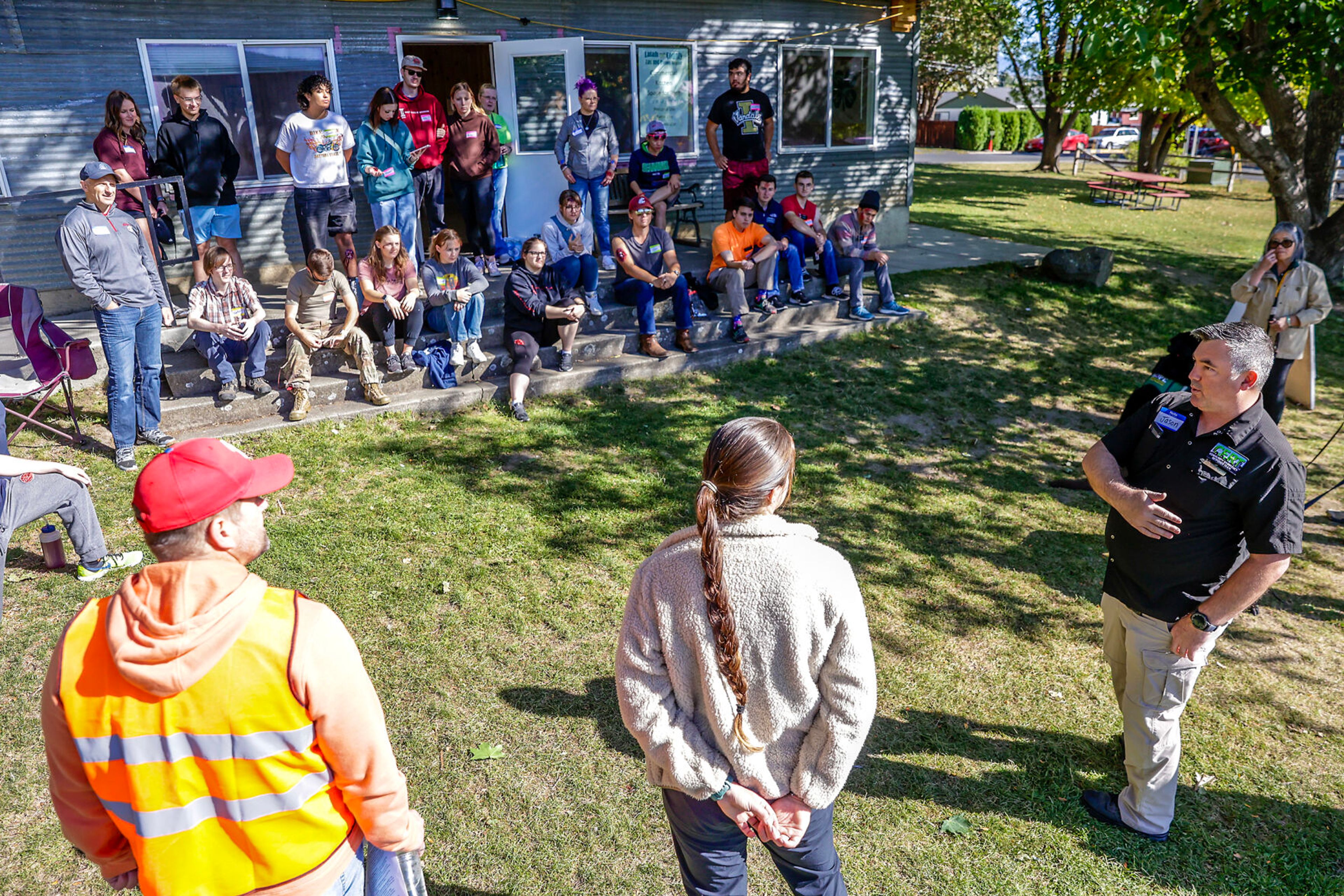 Jason Stooks speaks before a disaster simulation of a windstorm Saturday at the Latah County Fairgrounds.